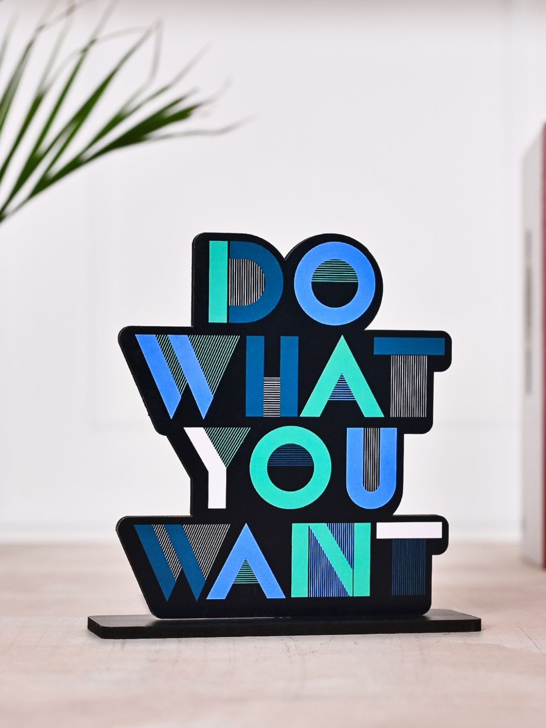 

DecorTwist Blue & Black Wooden Curio Showpiece
