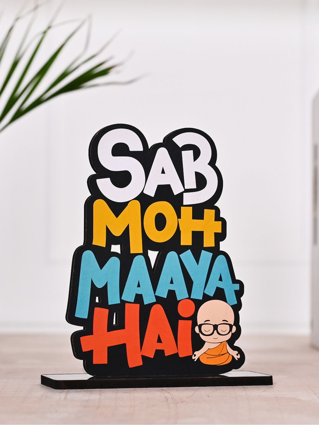 

DecorTwist White &Yellow Sab Moh Maya Hai Wood Curio Showpiece