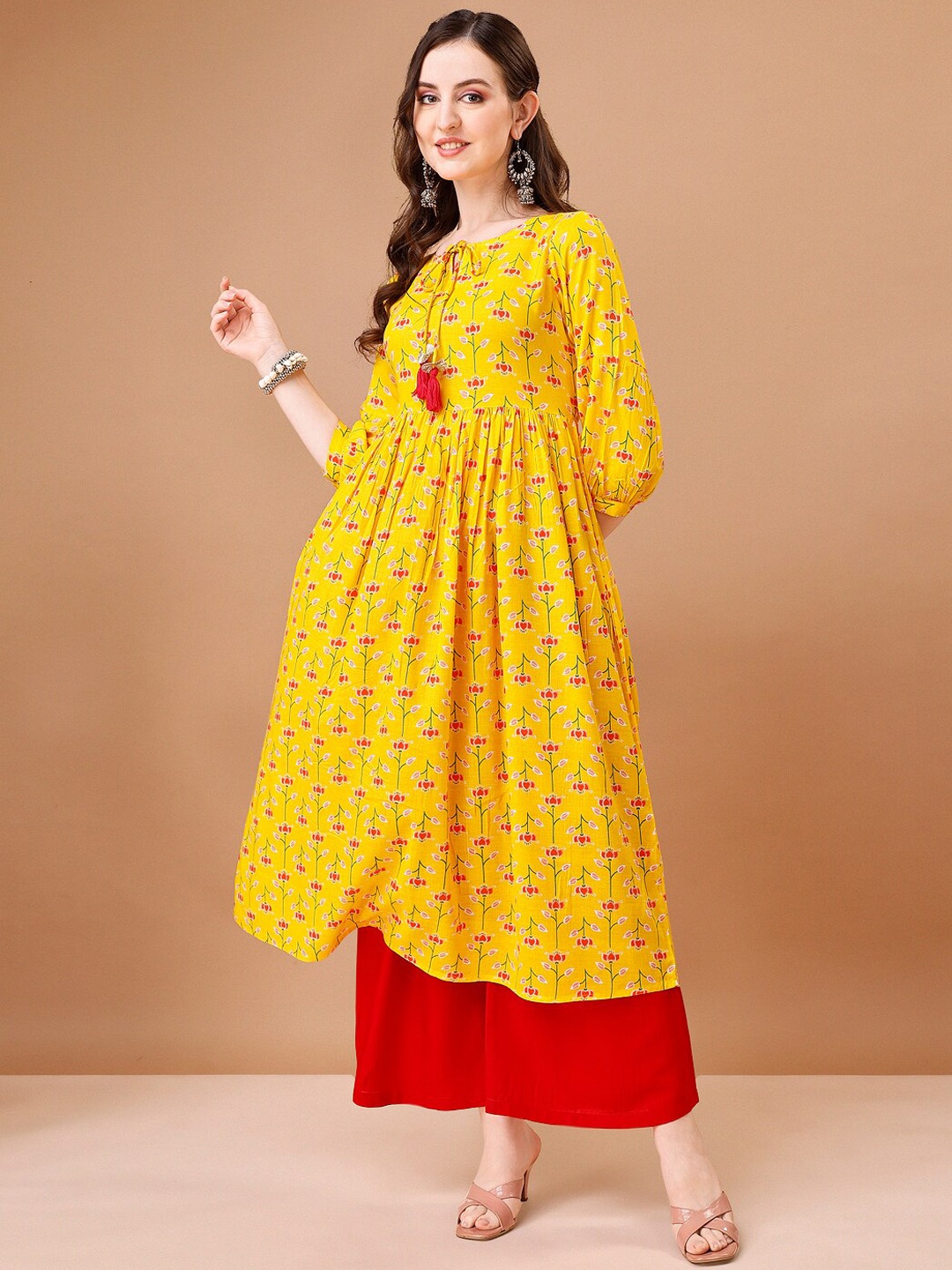 

KALINI Floral Printed Puffed Sleeves Tie-Up Neck Anarkali Kurta, Yellow