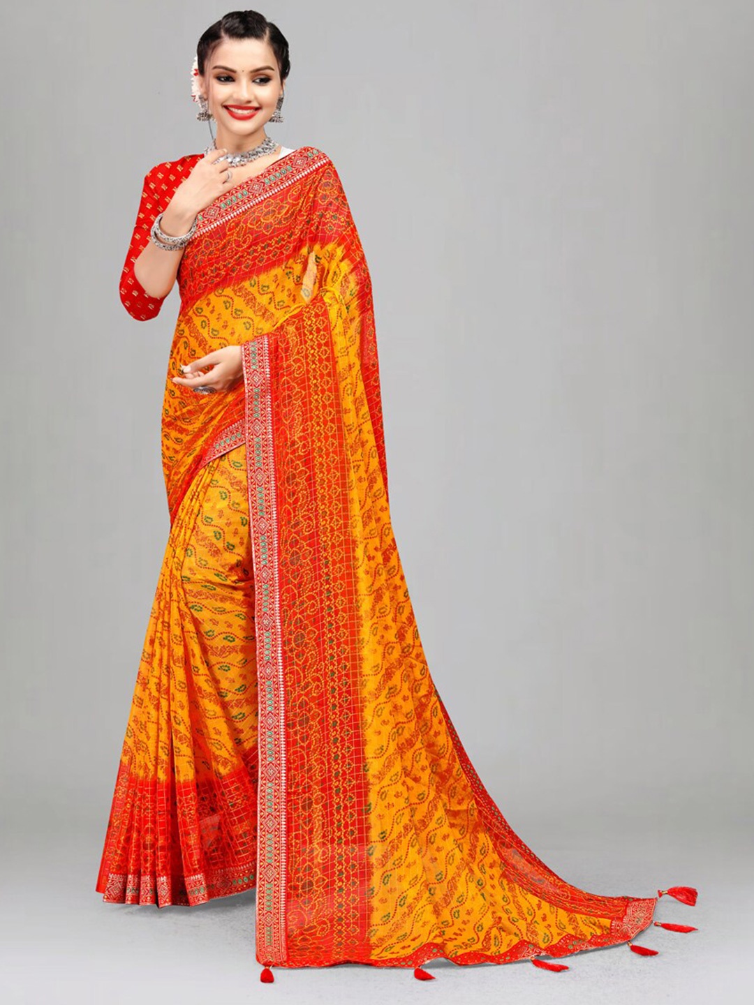 

Ariya Prints Printed Embroidered Pure Georgette Bandhani Saree, Mustard
