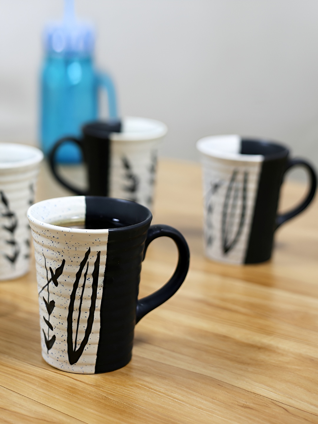 

Kittens 4 Pcs Black & White Hand Painted Ceramic Glossy Mugs - 300 ML Each