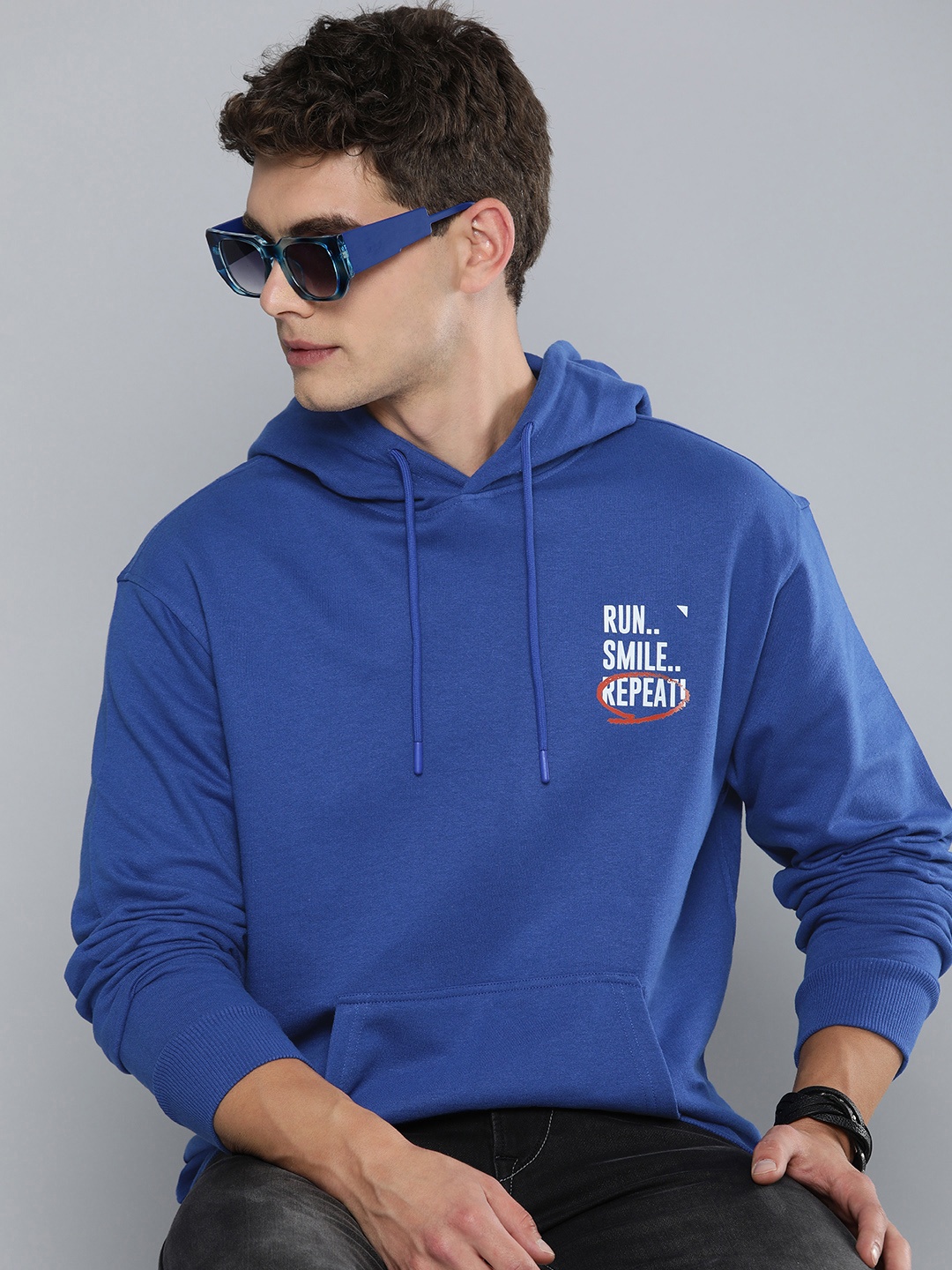

R.Code by The Roadster Life Co. Men Typography Printed Hooded Sweatshirt, Blue