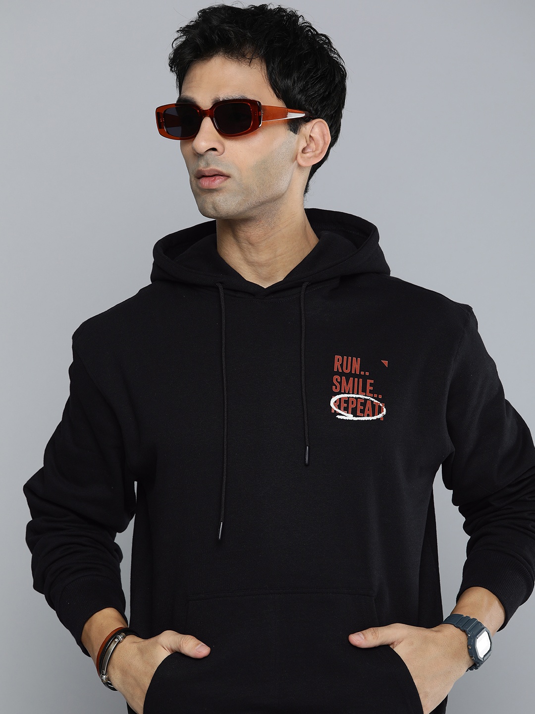 

R.Code by The Roadster Life Co. Men Typography Printed Hooded Sweatshirt, Black