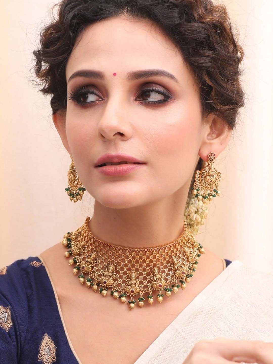 

Tarinika Shriya Gold-Plated CZ-Studded Beaded Antique Filigree Choker Jewellery Set