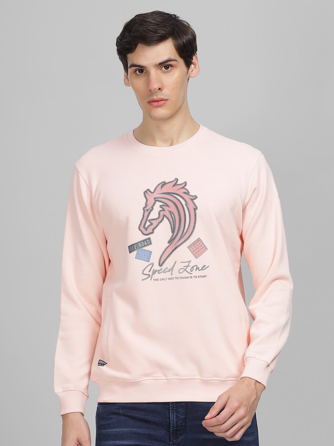 

Parcel Yard Graphic Printed Round Neck Fleece Pullover Sweatshirt, Peach