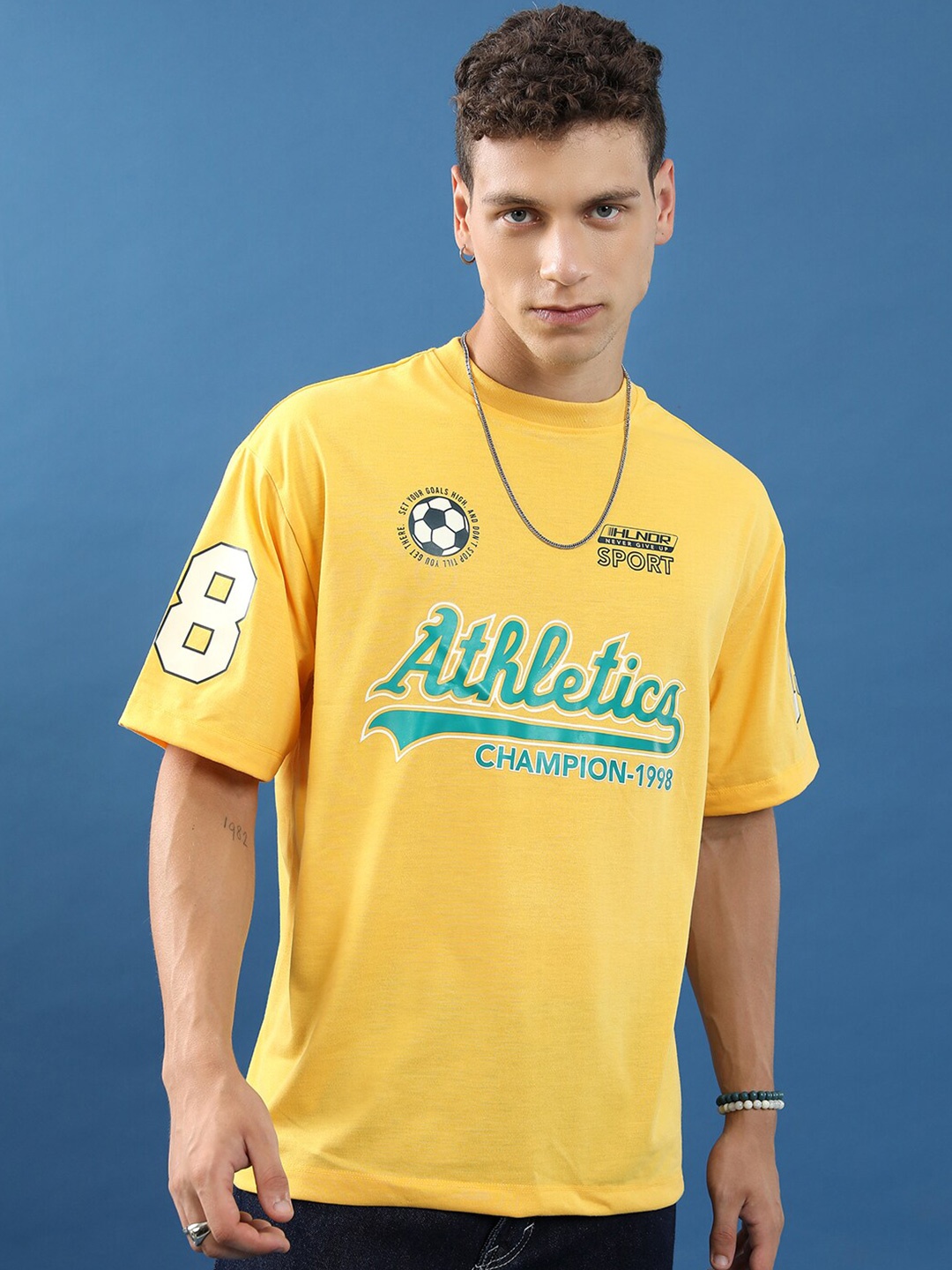 

HIGHLANDER Unisex Typography Printed Drop-Shoulder Sleeves Oversized T-shirt, Yellow