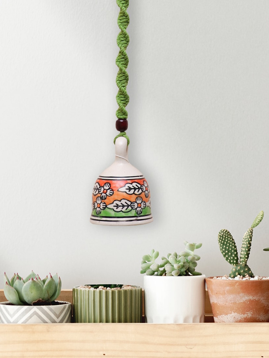 

Gathari Green & White Self Designed Ceramic Hanging Bell Wall Decor