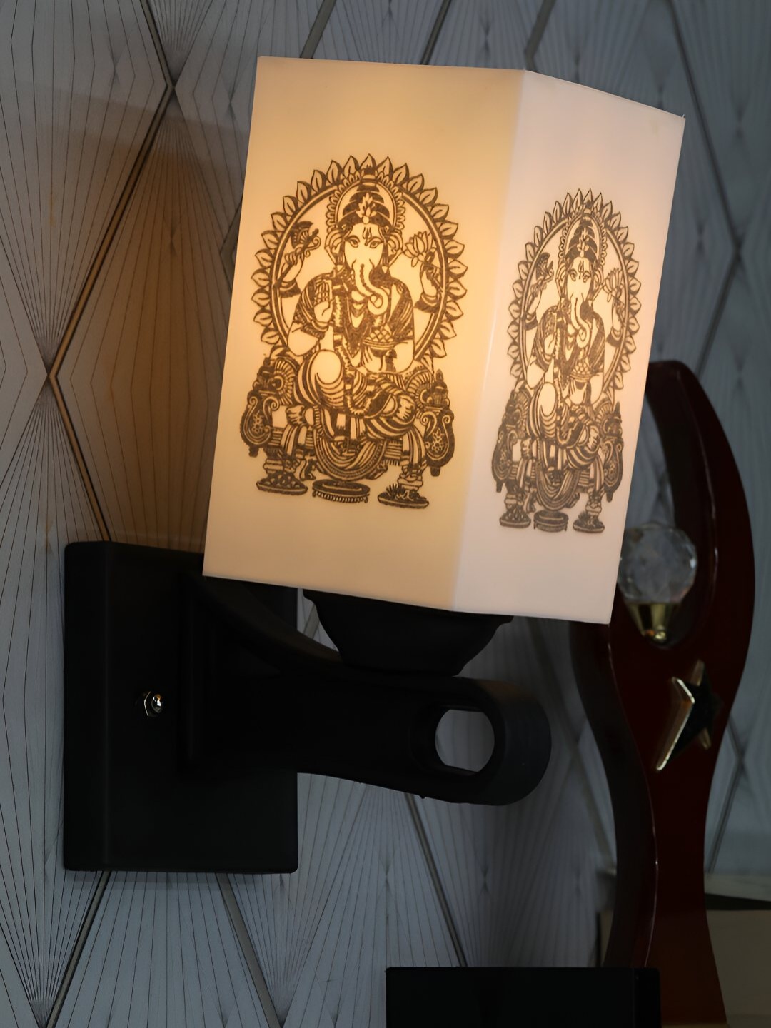 

Gojeeva White & Black Ganeshay Nama Printed Acrylic Traditional Rectangle Shaped Wall Lamp