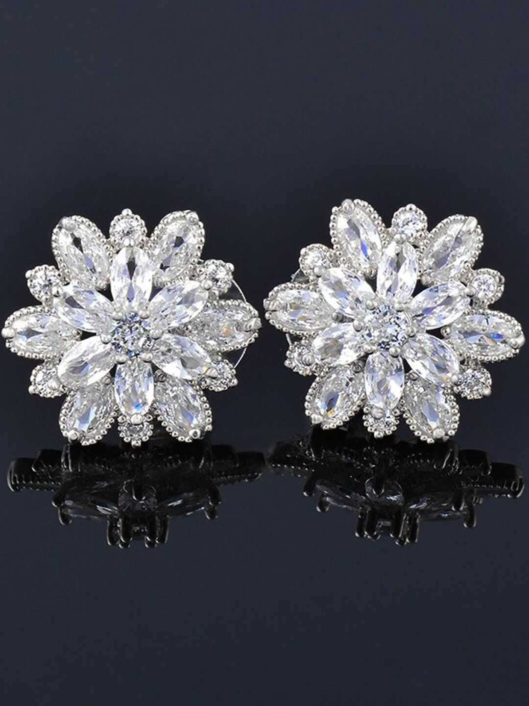 

Designs & You Silver Plated American Diamond Studded Floral Studs Earrings