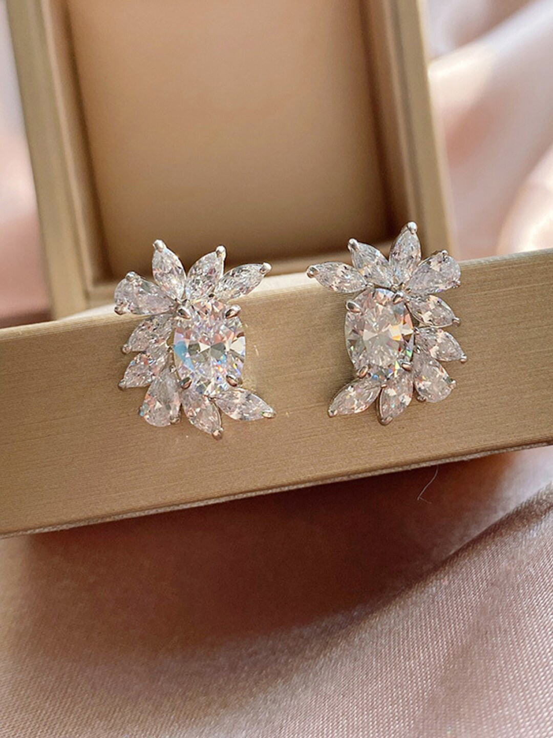 

Designs & You Silver-Plated Contemporary Studs Earrings