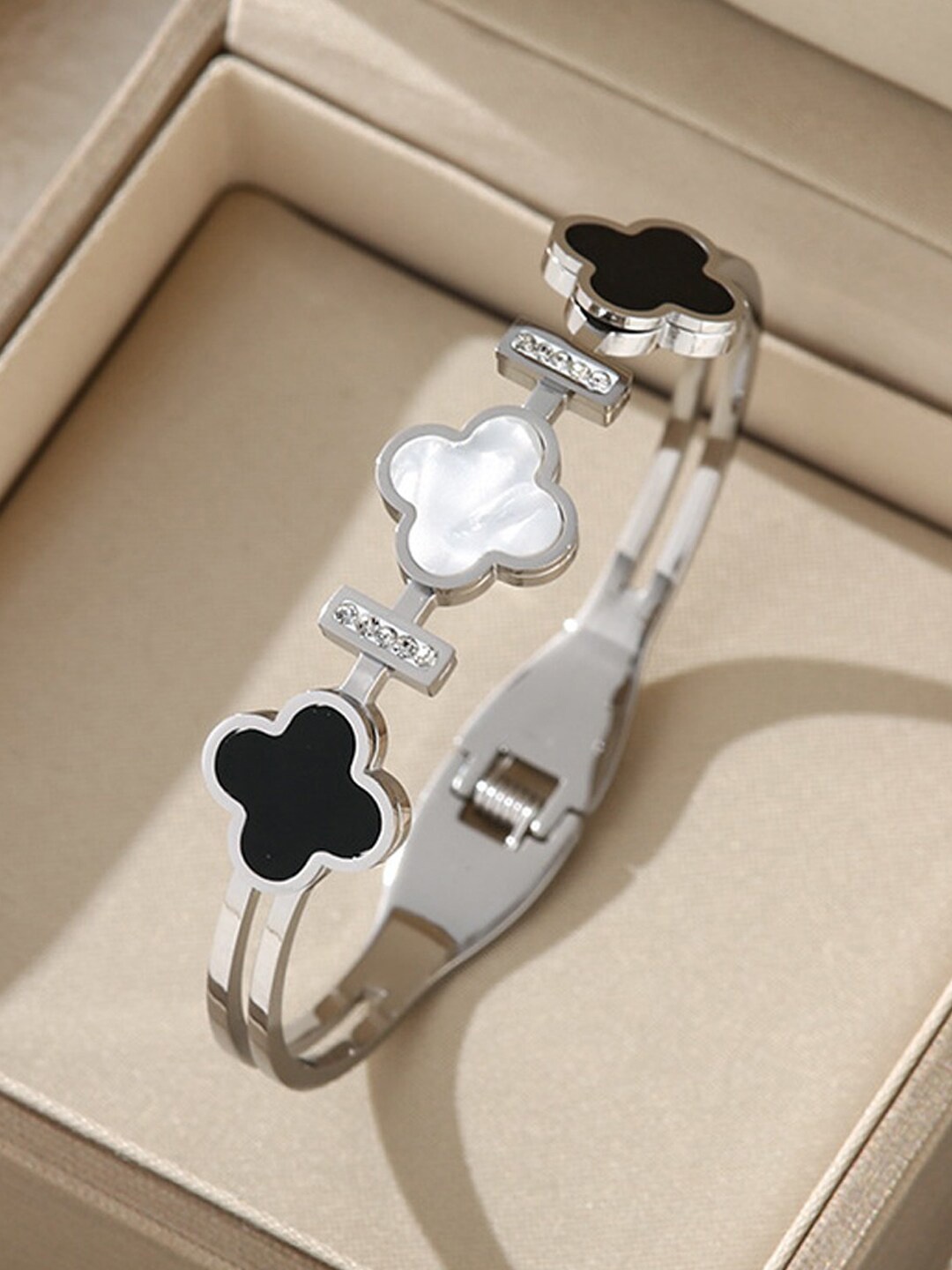 

Designs & You Women Silver-Plated Stainless Steel Stone-Studded Bangle-Style Bracelet