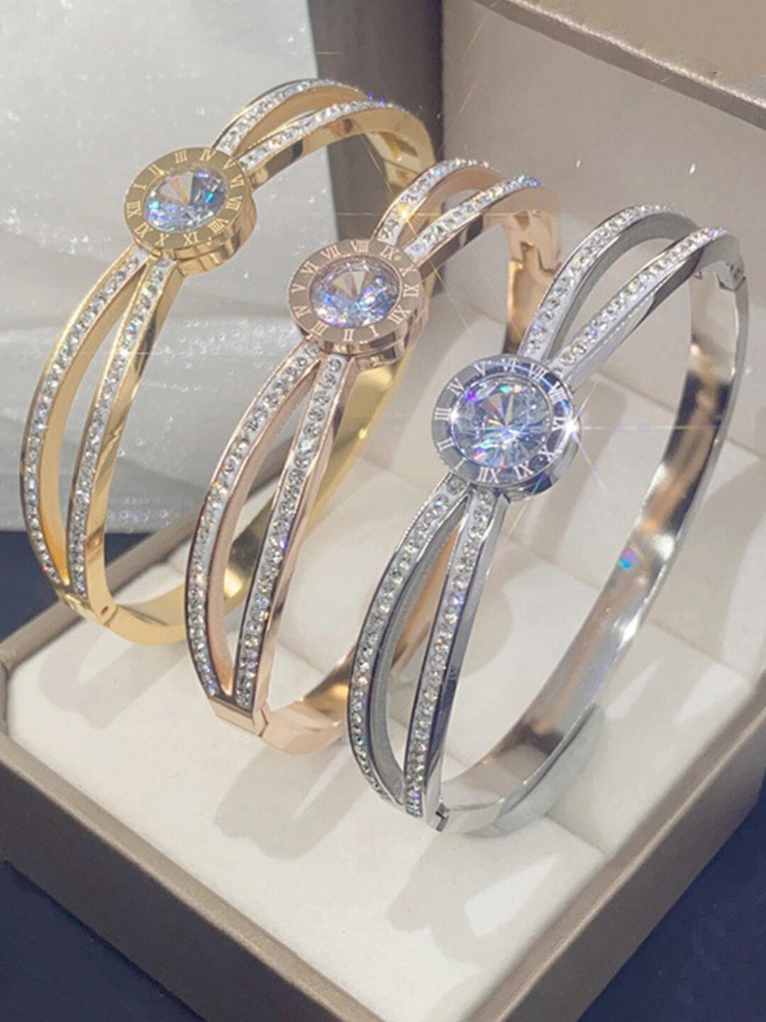 

Designs & You Set Of 3 American Diamond Studded Stainless Steel Bangle Style Bracelets, Rose gold