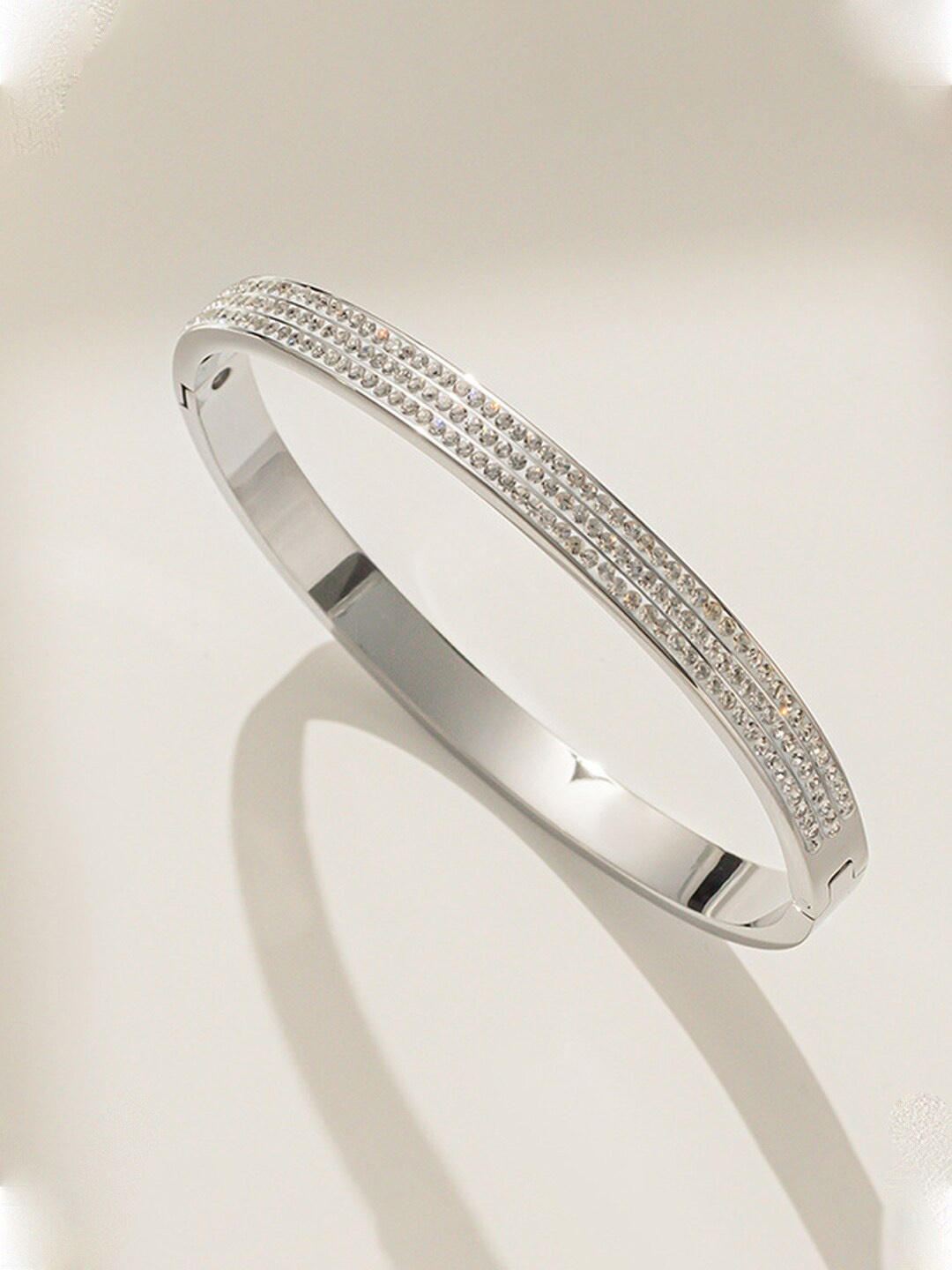 

Designs & You American Diamond Silver-Plated Bangle-Style Bracelet