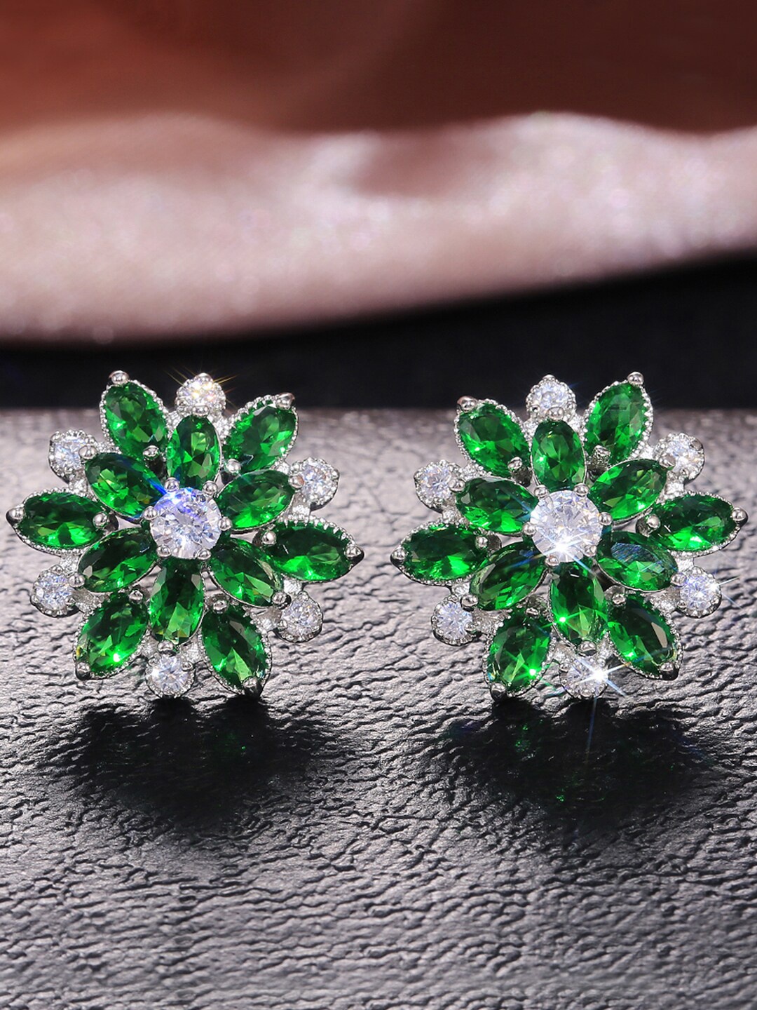 

Designs & You Silver-Plated Floral American Diamond Studded Studs Earrings