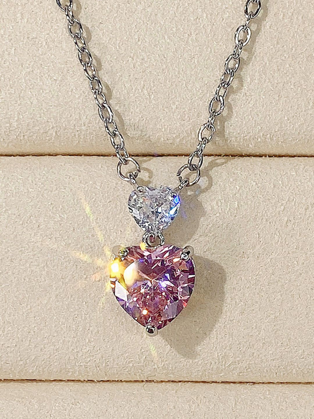 

Designs & You Silver-Plated American Diamond-Studded Heart Pendant With Chain