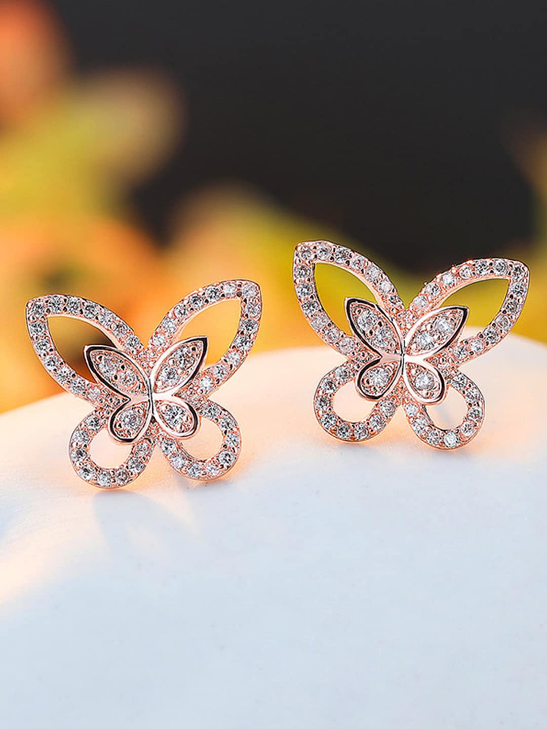 

Designs & You Rose Gold Plated American Diamond Studded Studs Earrings