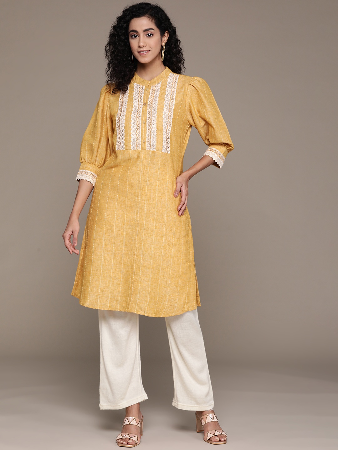 

aarke Ritu Kumar Women Yoke Design Thread Work Cotton Kurta, Yellow