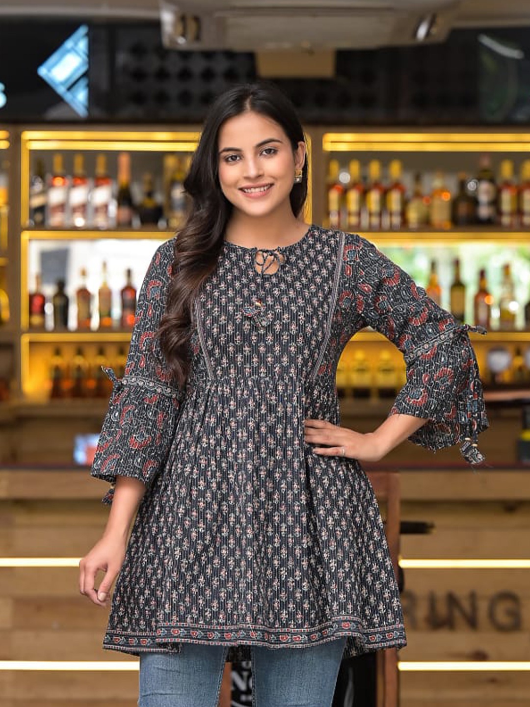 

Advya Ethnic Motifs Printed Tie - Up Neck Gathers Detail Cotton Tunic, Black