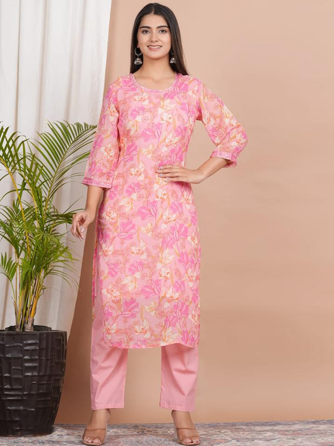 

Advya Floral Printed Regular Thread Work Kurta With Trousers, Pink