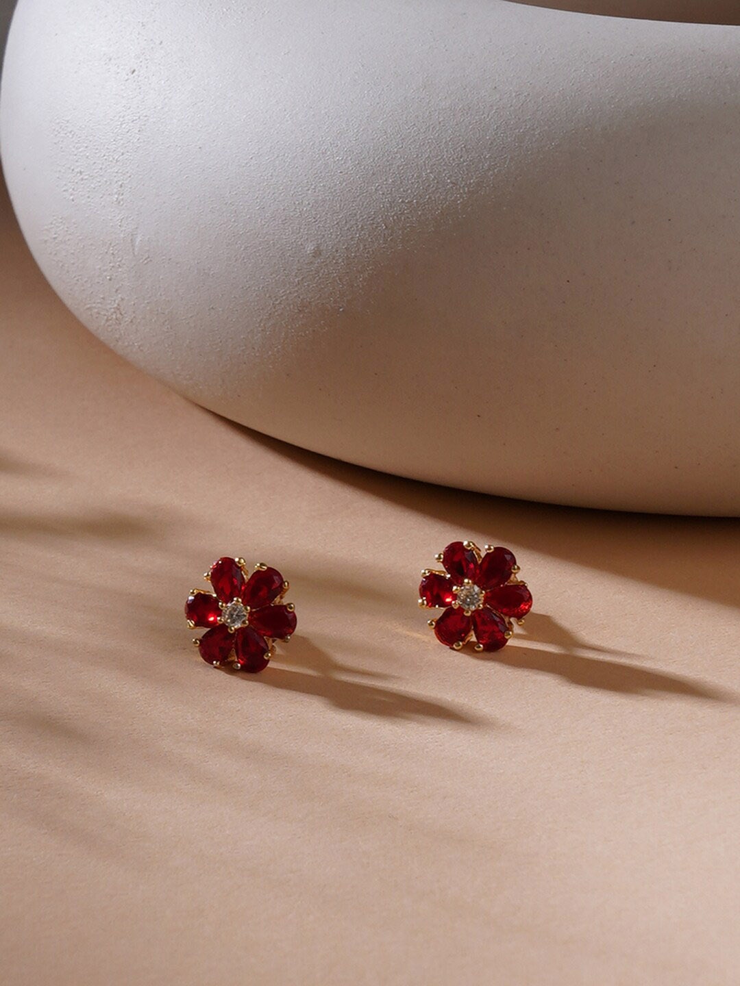 

Ruby Raang Gold-Plated Artificial Stones-Studded Floral Shaped Studs Earrings, Maroon