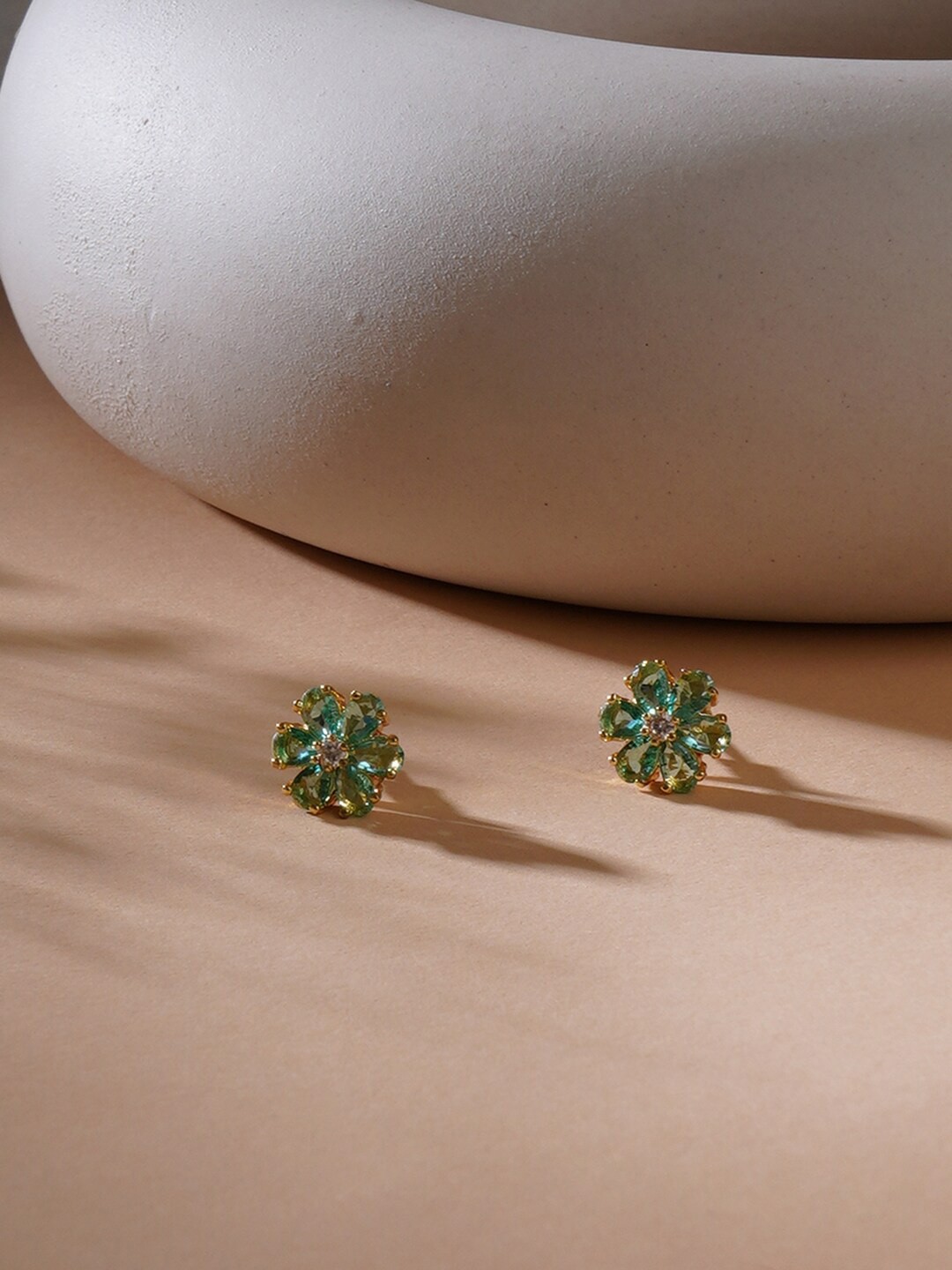 

Ruby Raang Gold-Plated Artificial Stones-Studded Floral Shaped Studs Earrings