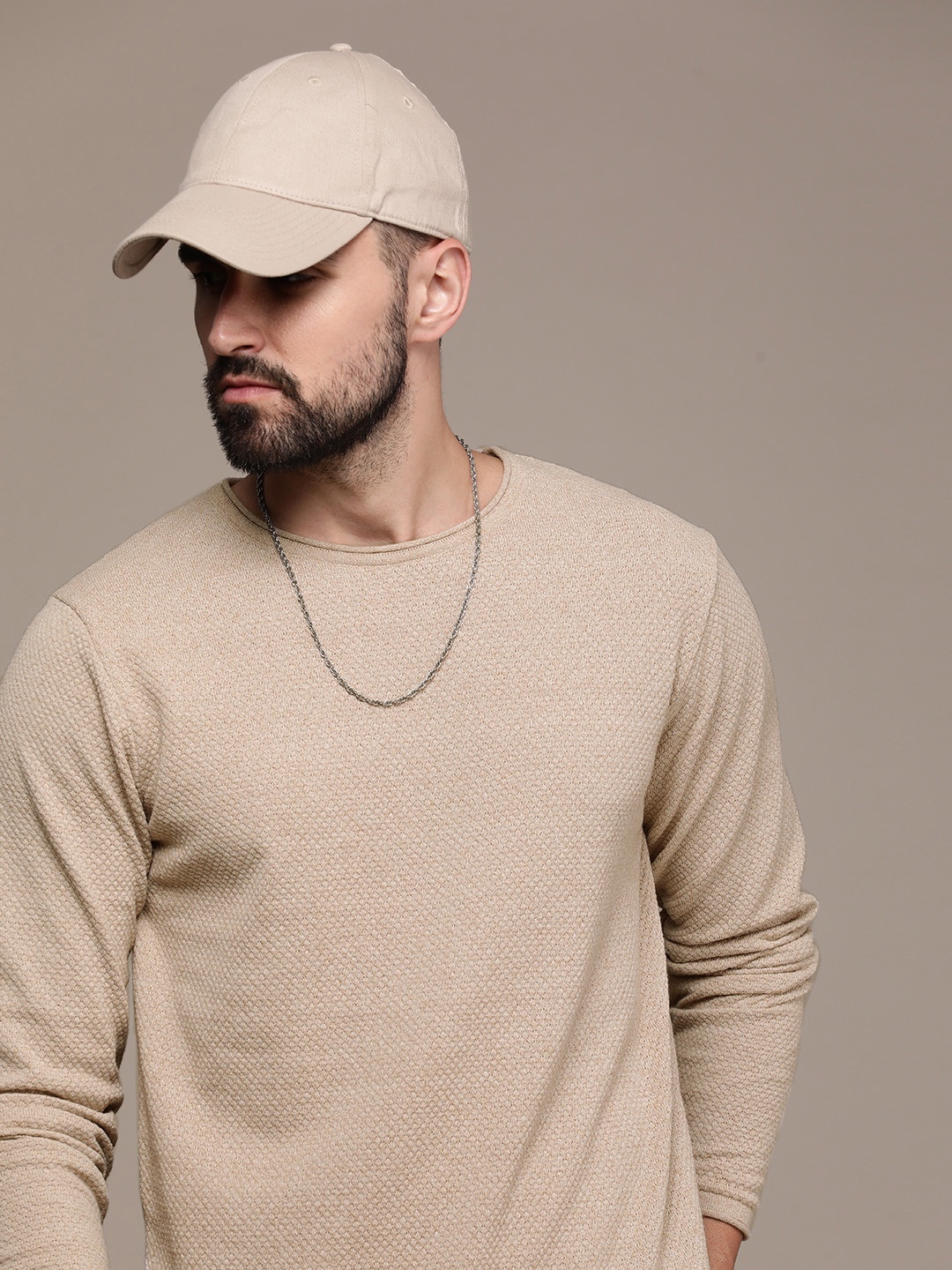 

Roadster Men Solid Pullover Sweater, Beige