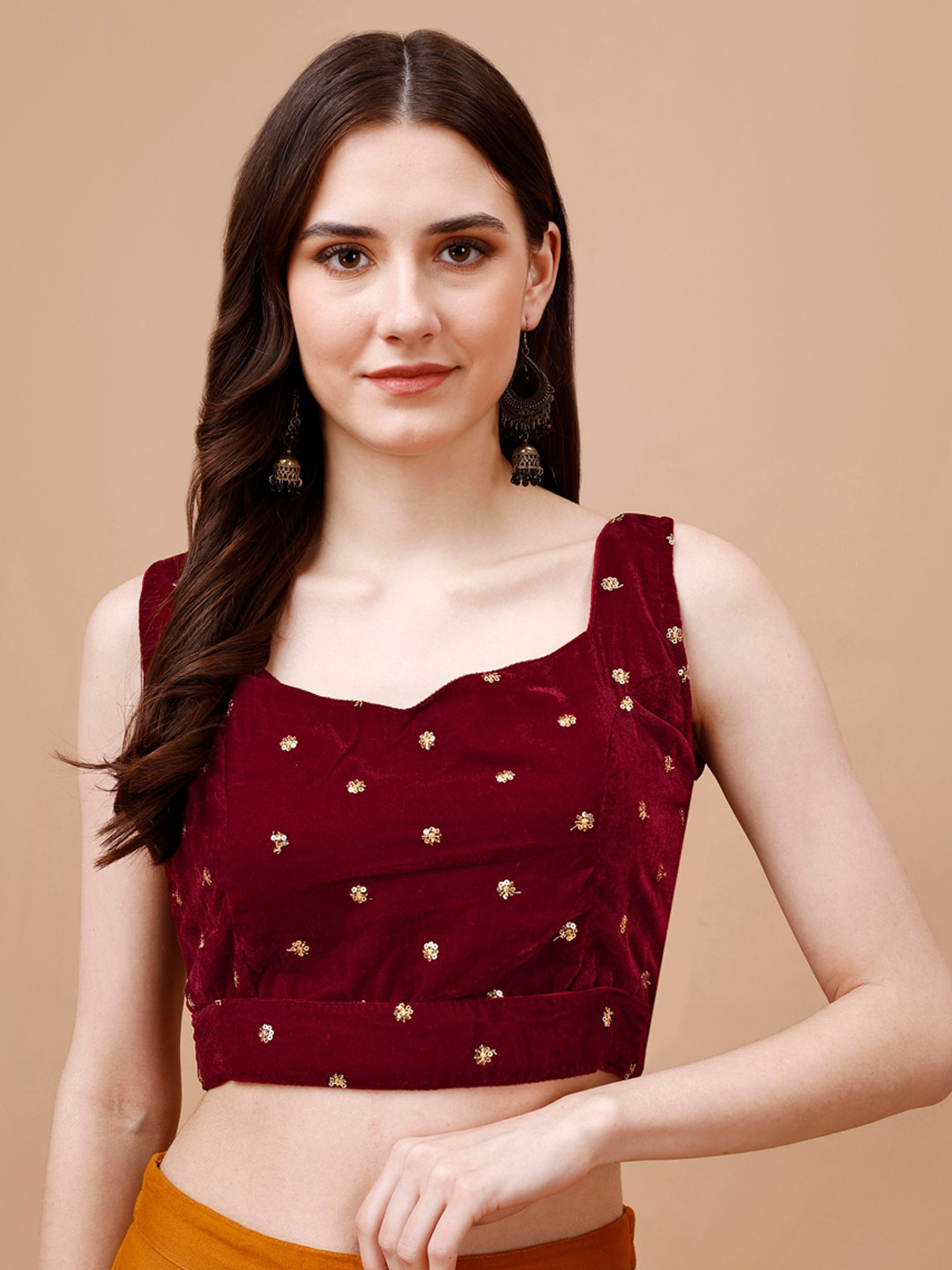 

Tikhi Imli Embroidered sleeveless Velvet Saree Bouse, Maroon