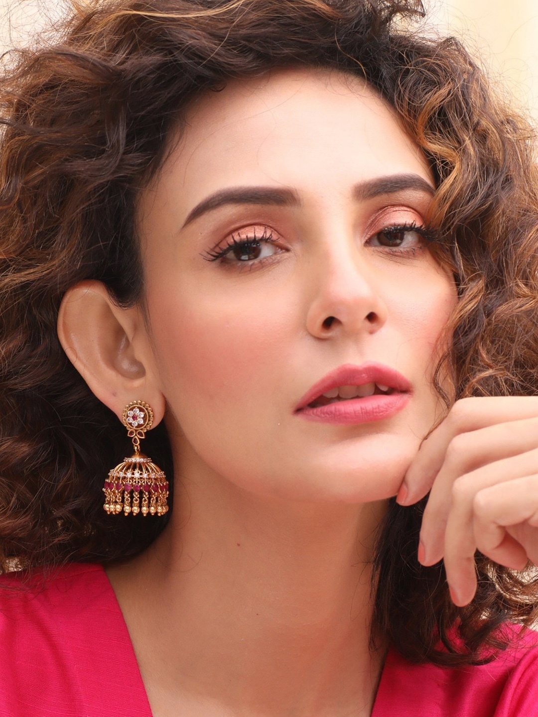 

Tarinika Gold-Plated Cubic Zirconia Studded Dome Shaped Jhumkas
