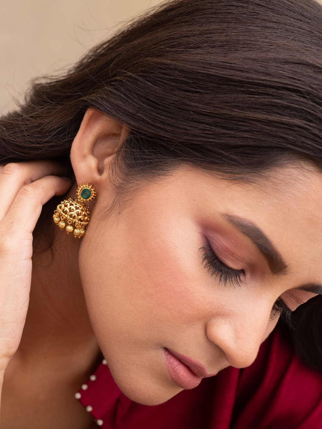 

Tarinika Gold-Plated Dome Shaped Antique Jhumkas