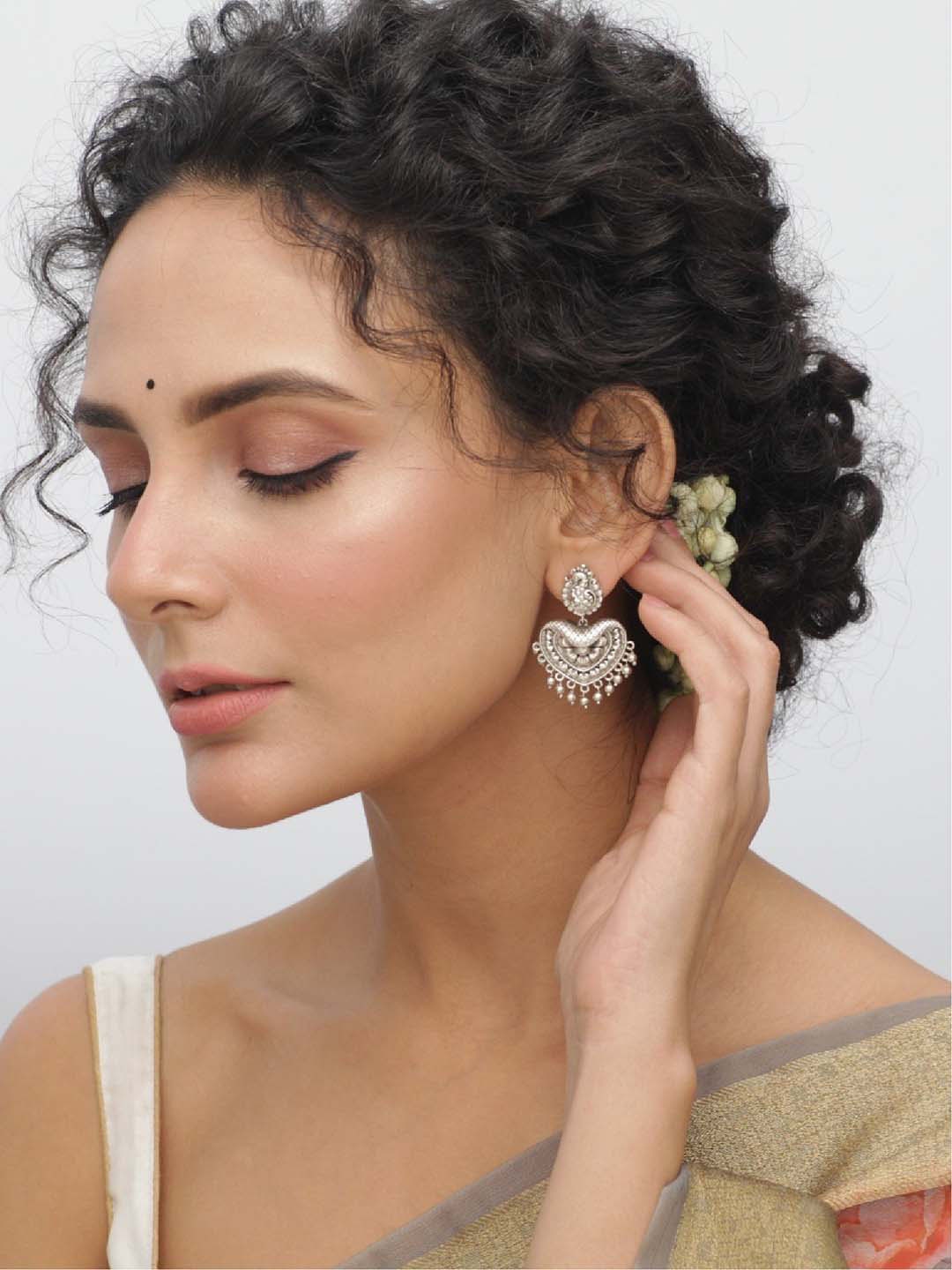 

Tarinika Silver-Plated Floral Antique Oxidized Chandbali