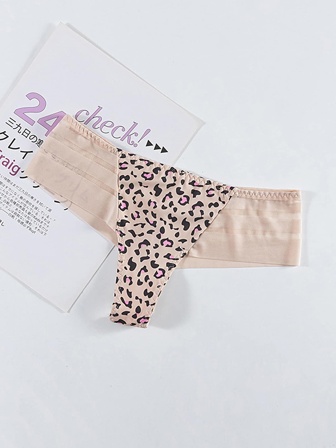 

LULU & SKY Abstract Printed Low-Rise Thongs, Beige