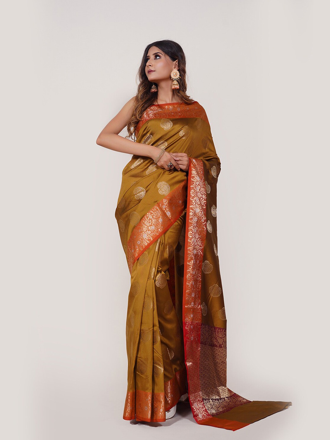 

PTIEPL Banarasi Silk Works Ethnic Motifs Woven Design Zari Banarasi Saree, Mustard