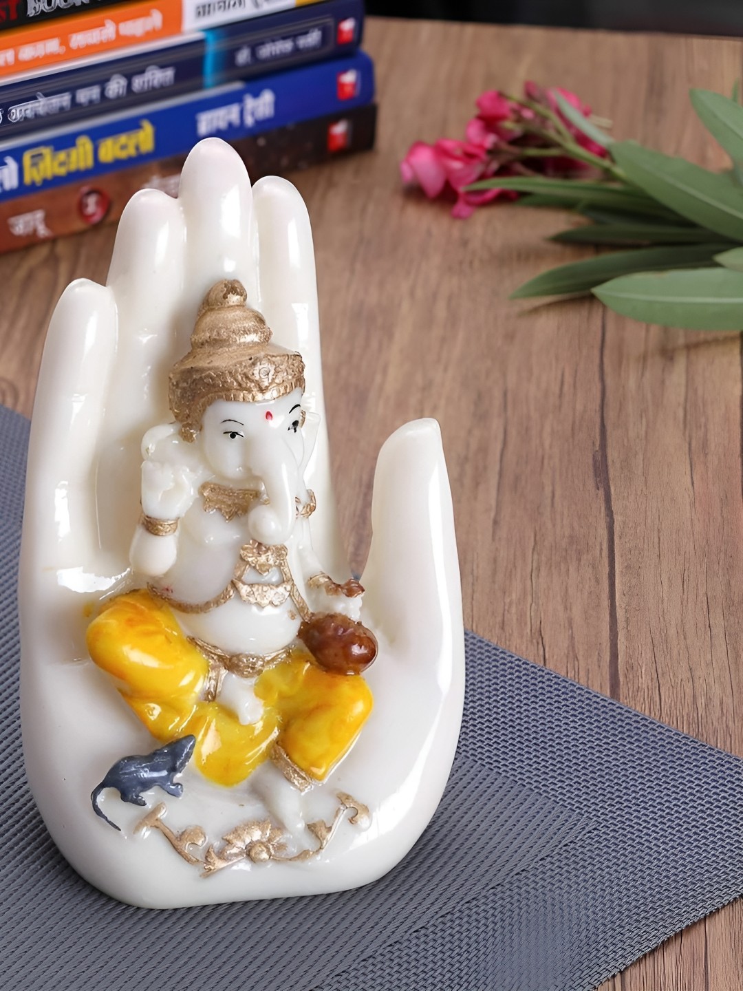 

HOME AUZAR White Medium Ganesha Sitting on Hand Showpiece