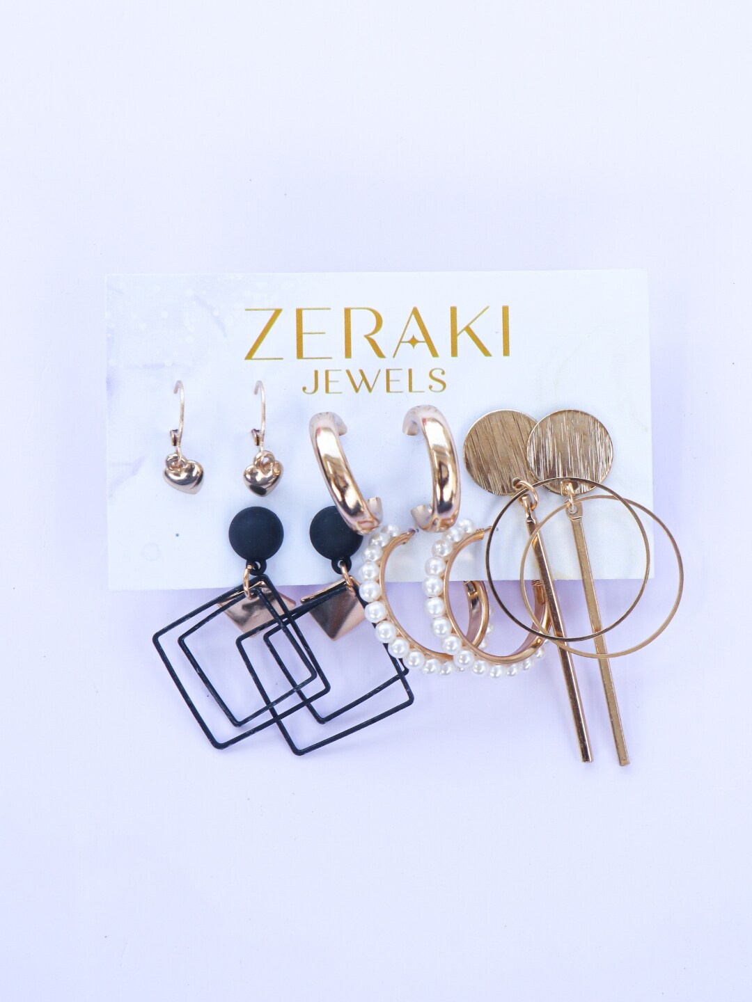 

Zeraki Jewels Set Of 5 Silver-Plated Artificial Beads Drop & Hoop Earrings