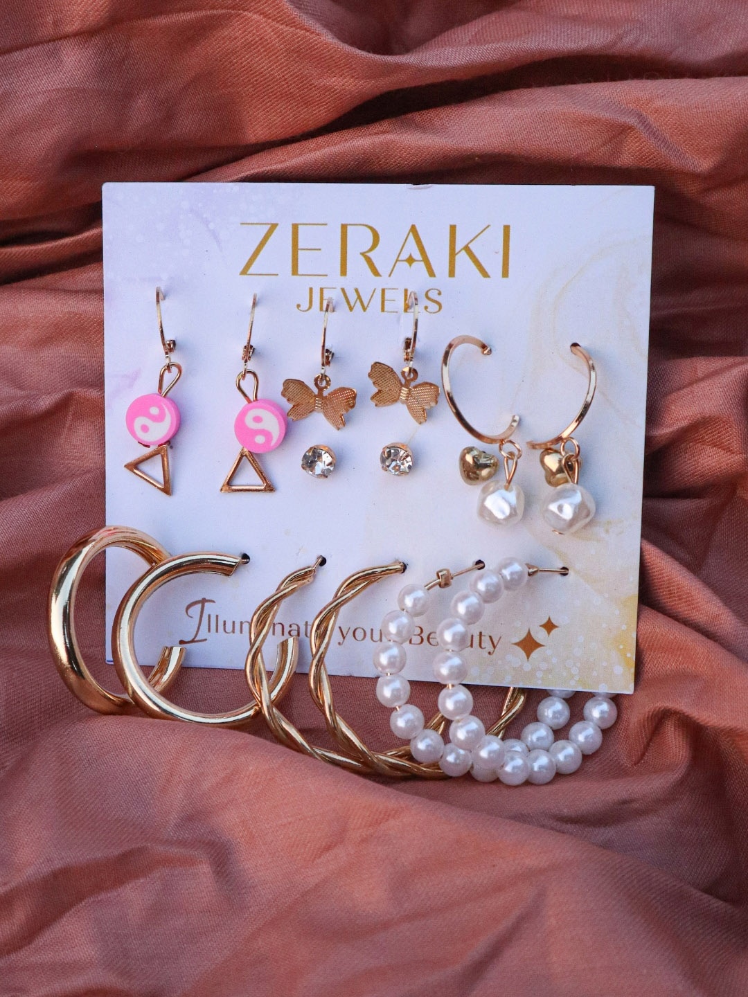 

Zeraki Jewels Set Of 9 Gold-Plated Cubic Zirconia Hoop Earrings