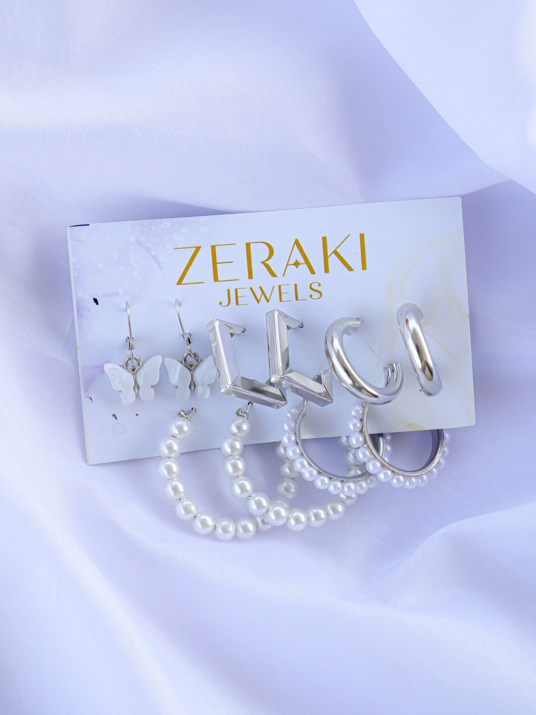 

Zeraki Jewels Set Of 5 Silver-Plated Cubic Zirconia Hoop Earrings