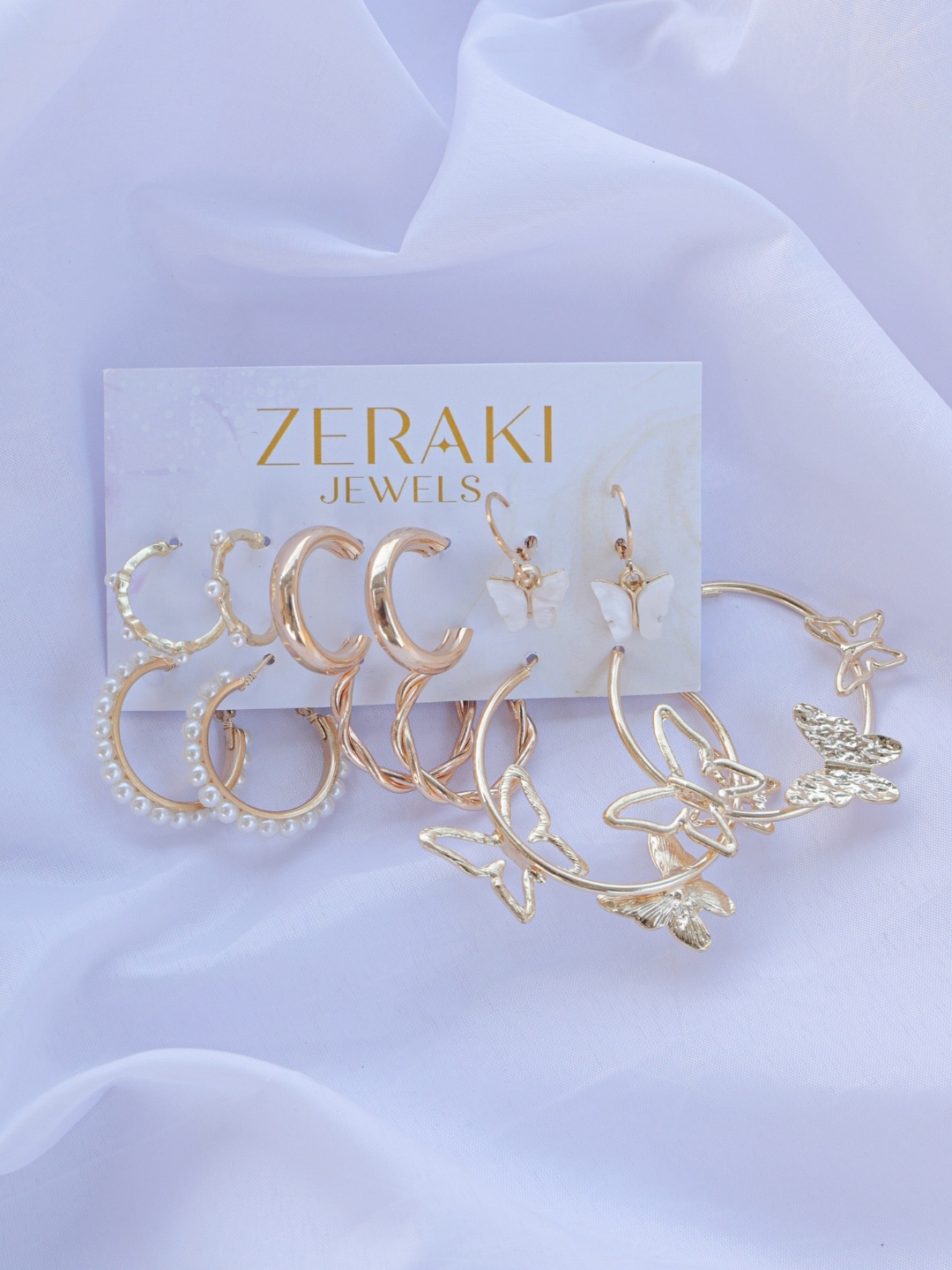 

Zeraki Jewels Set Of 6 Gold-Plated Cubic Zirconia Hoop Earrings