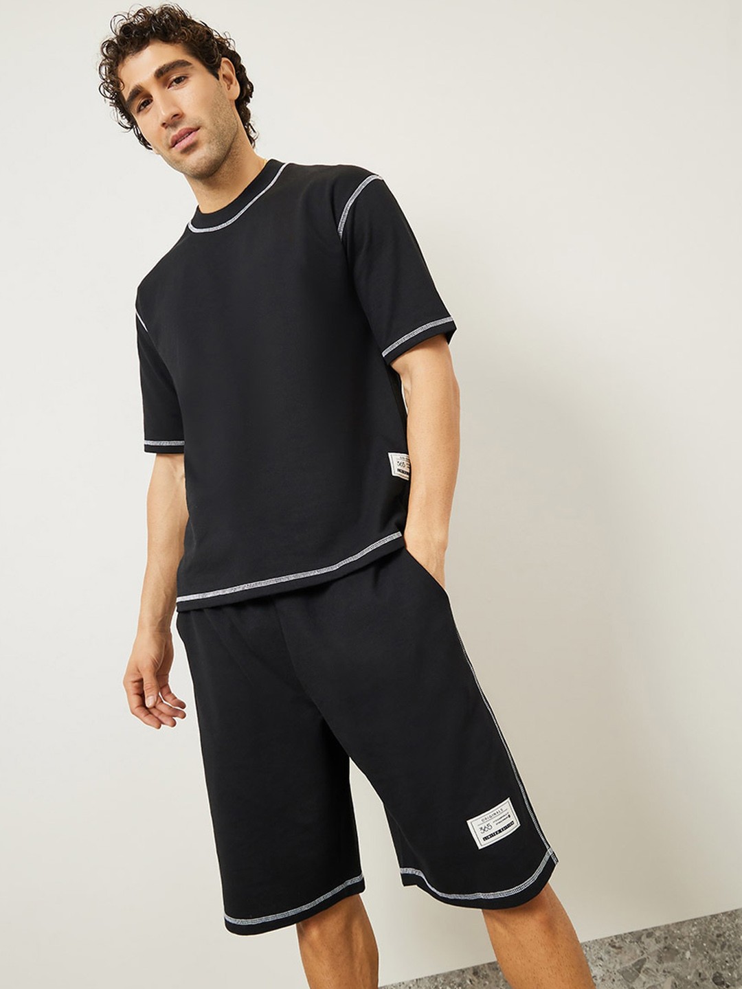 

Styli Round Neck Oversized Contrast Overlock Terry T-Shirt & Shorts Co-ords, Black