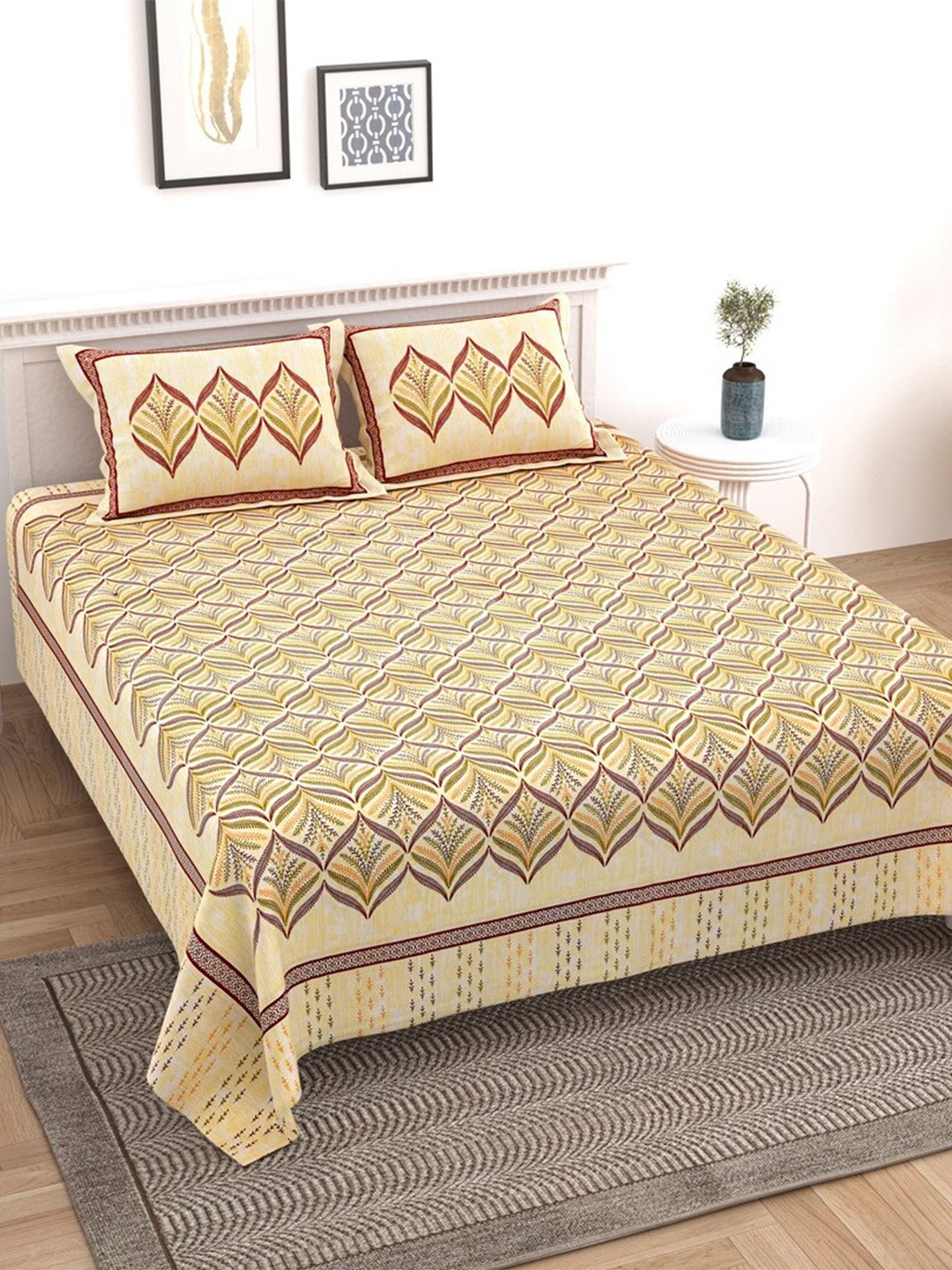 

Texstylers Yellow & Maroon Cotton 210 TC King Bedsheet with 2 Pillow Covers