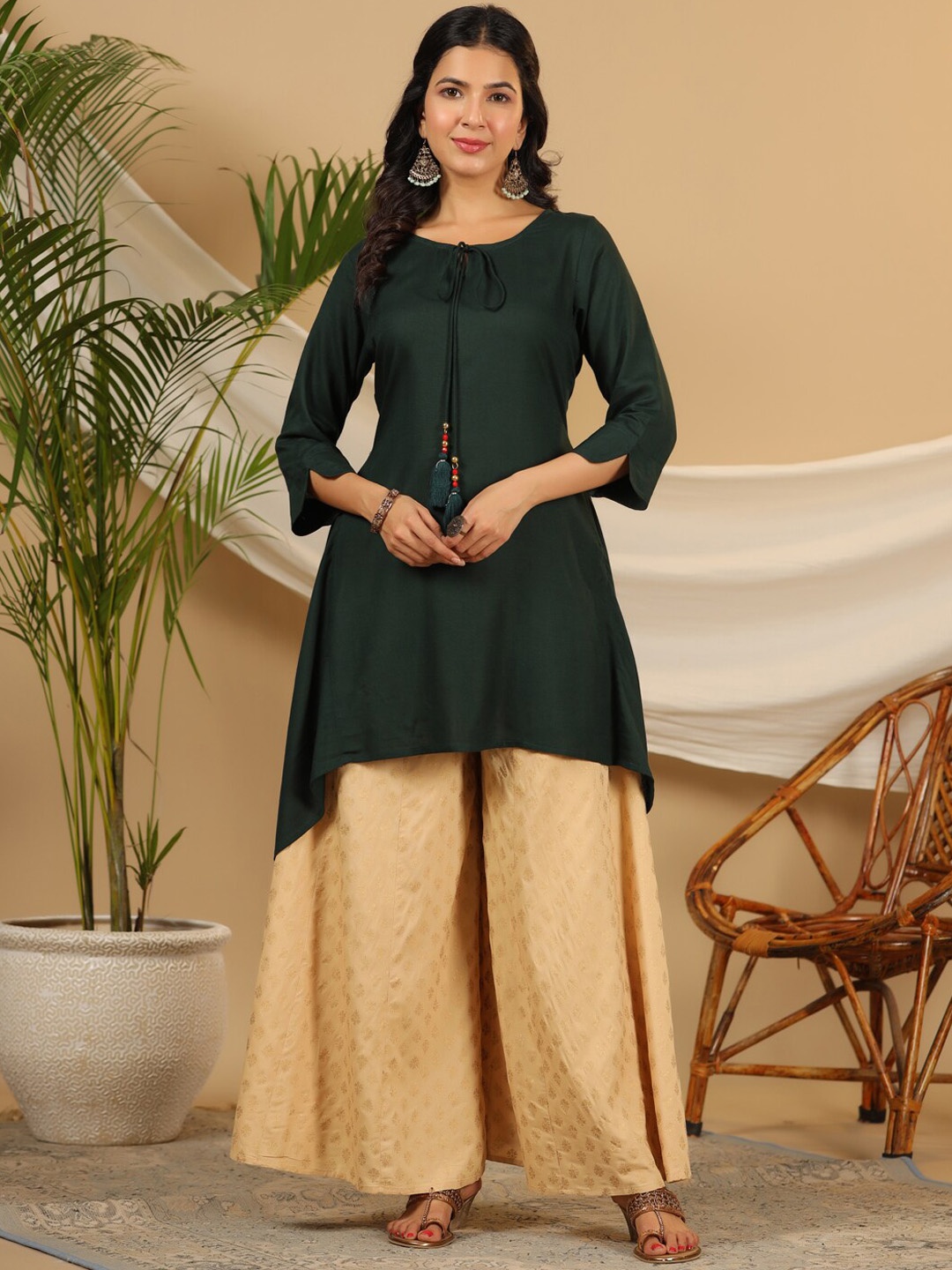 

Juniper Tie Up Neck Liva Asymmetric Kurta With Palazzo, Green