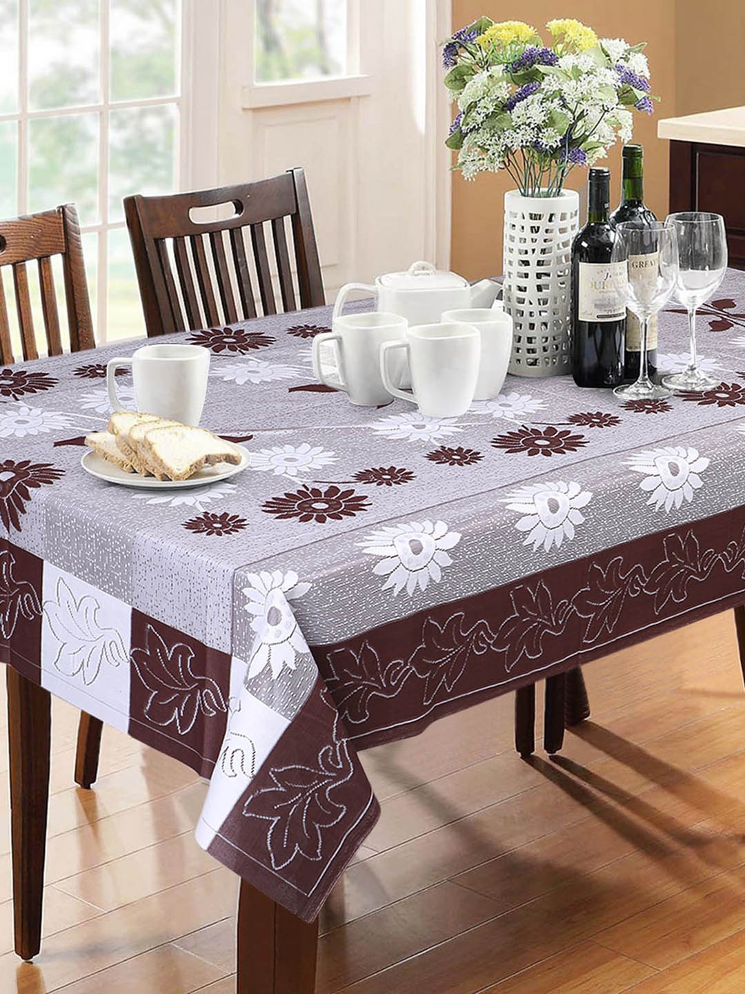 

Dakshya Industries Brown & White Floral 6 Seater Pure Cotton Table Cover