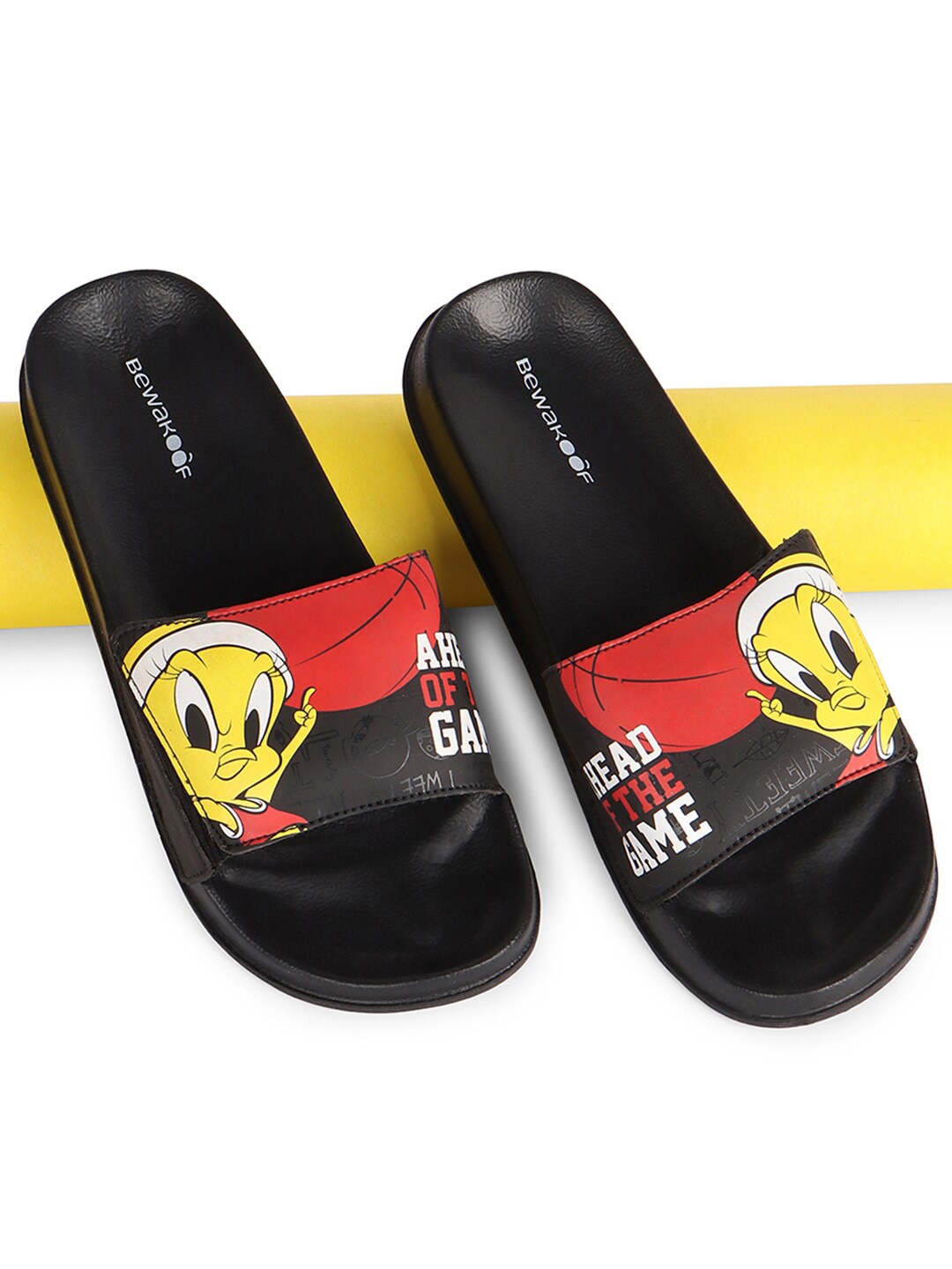 

Bewakoof Women Tunesquad Printed Rubber Sliders, Black