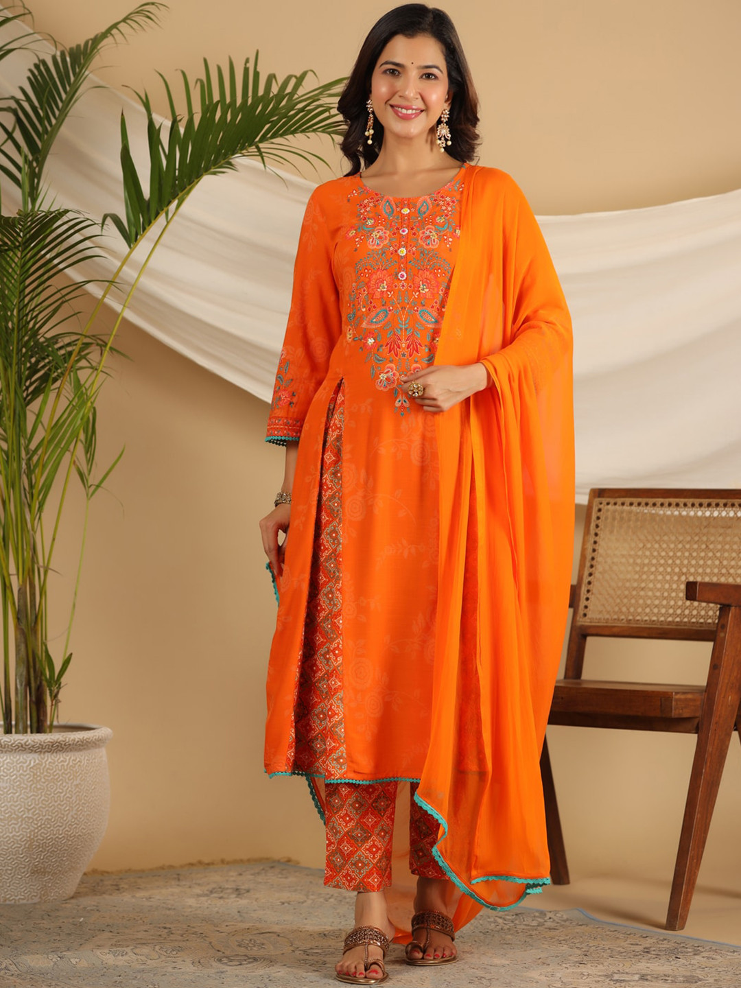 

Juniper Ethnic Motifs Printed Panelled Beads and Stones Kurta With Trousers & Dupatta, Orange
