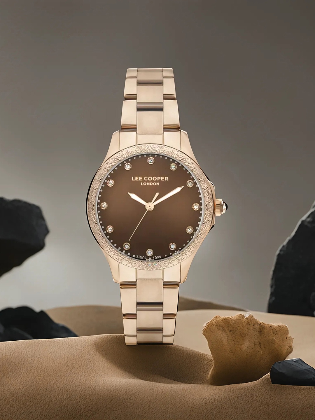 

Lee Cooper Women Embellished Brass Dial & Bracelet Style Straps Analogue Watch LC07840.540, Brown