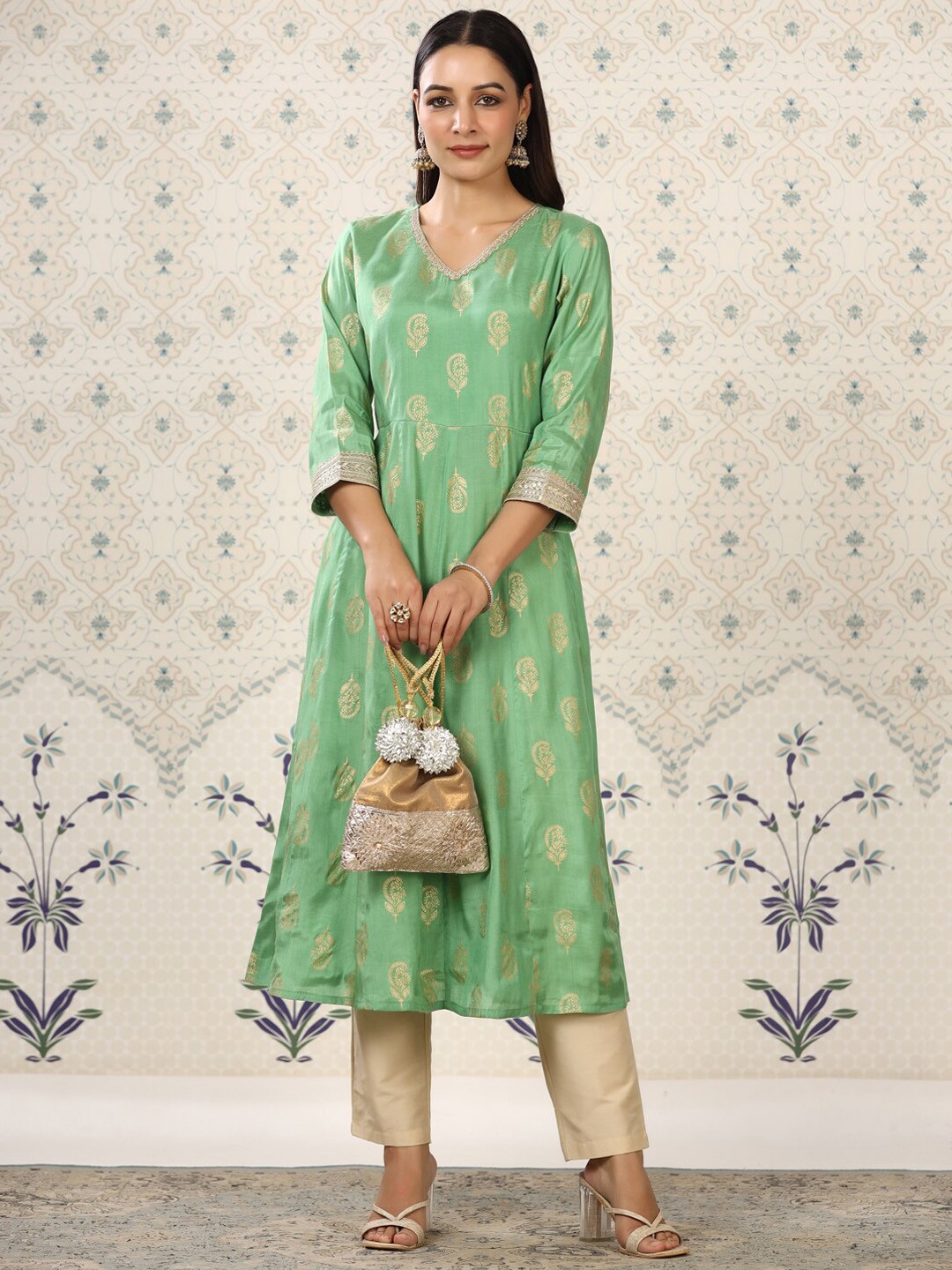 

Ode by House of Pataudi Green Ethnic Motifs V-Neck A-line Kurta