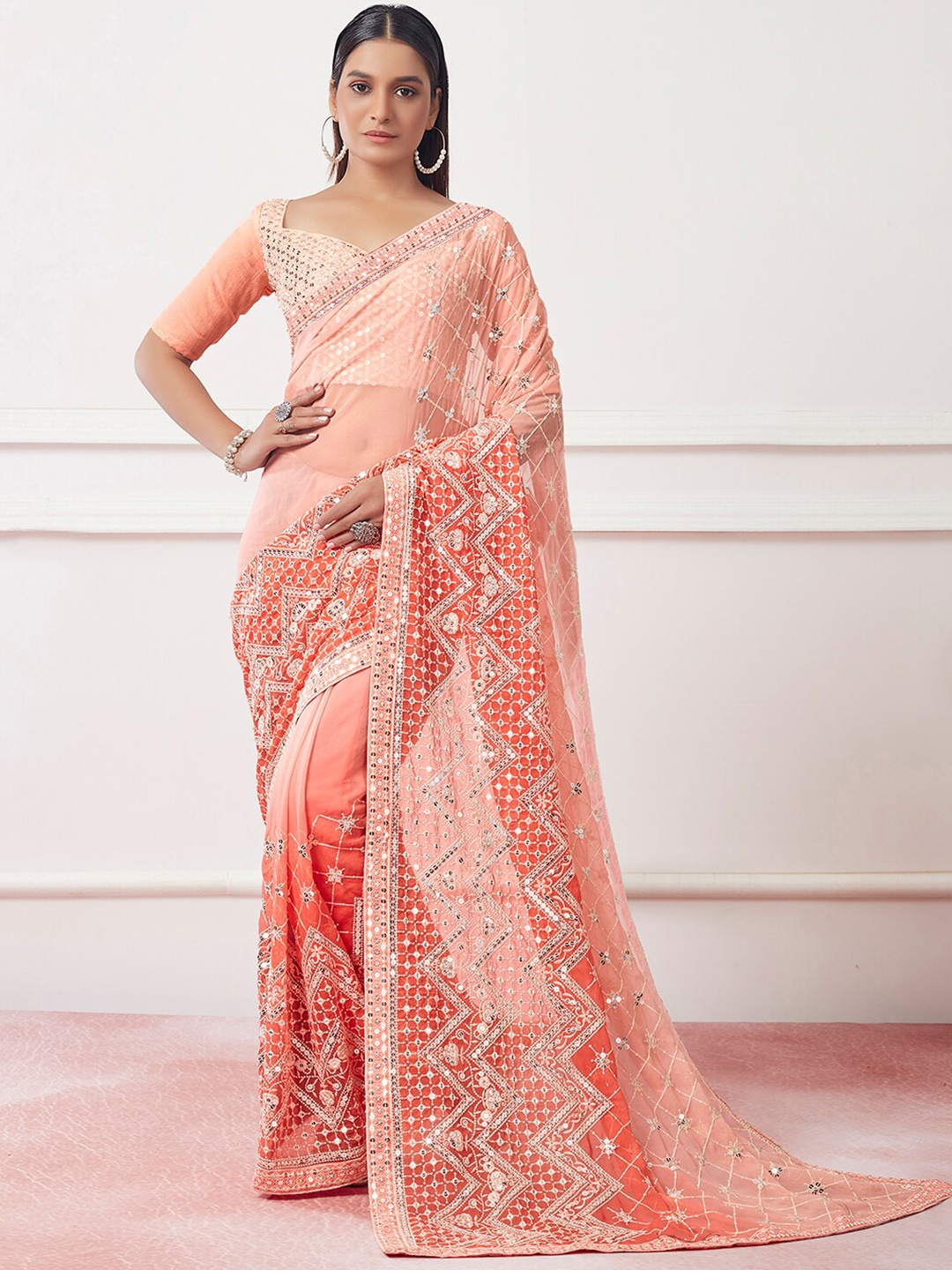 

Kalista Peach-Coloured Ethnic Motifs Embroidered Sequinned Detailed Net Saree