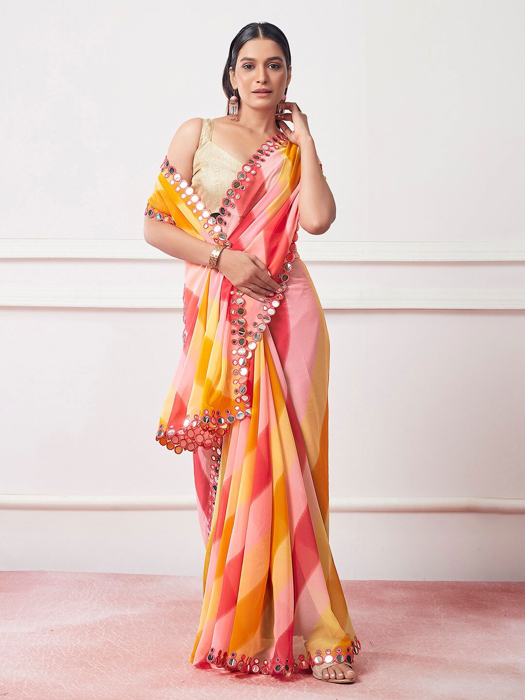 

Kalista Yellow Striped Mirror Work Detailed Pure Georgette Saree