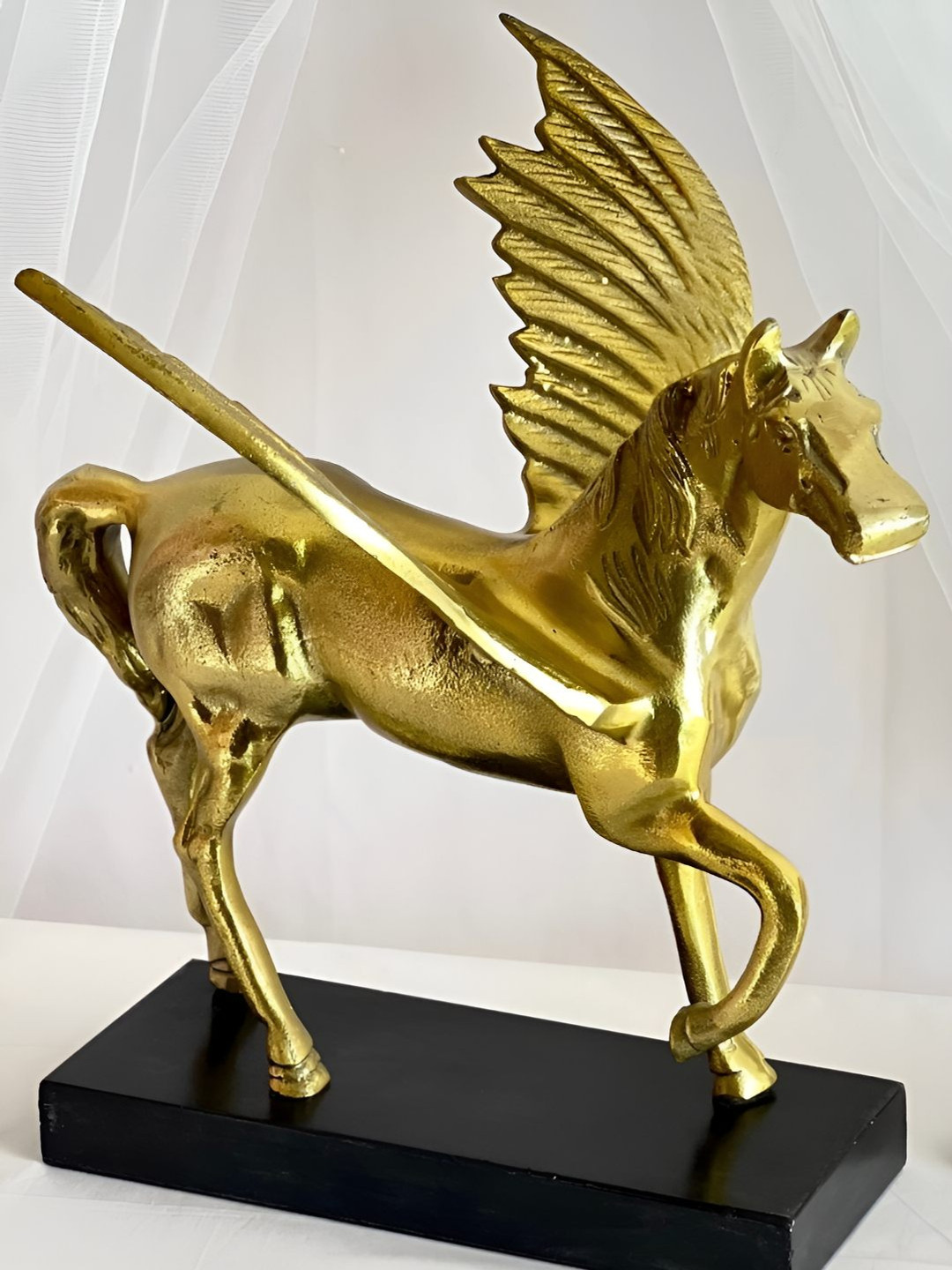 

Timaya's Decor Gold Toned Aluminium Medium Horse Figurine Showpiece