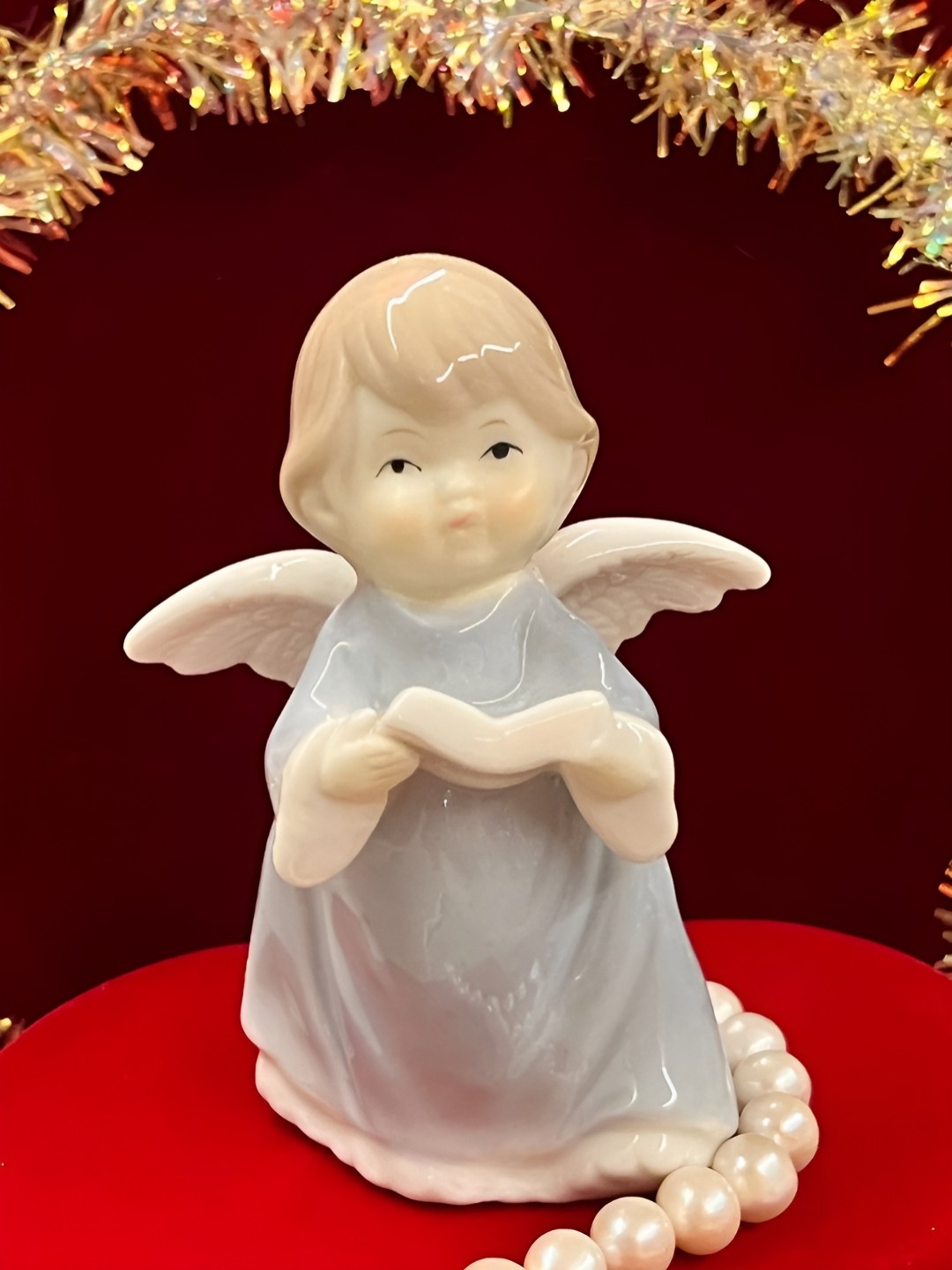 Timaya's Decor Grey & Cream Ceramic Small Reading Baby Angel Figurine Showpiece