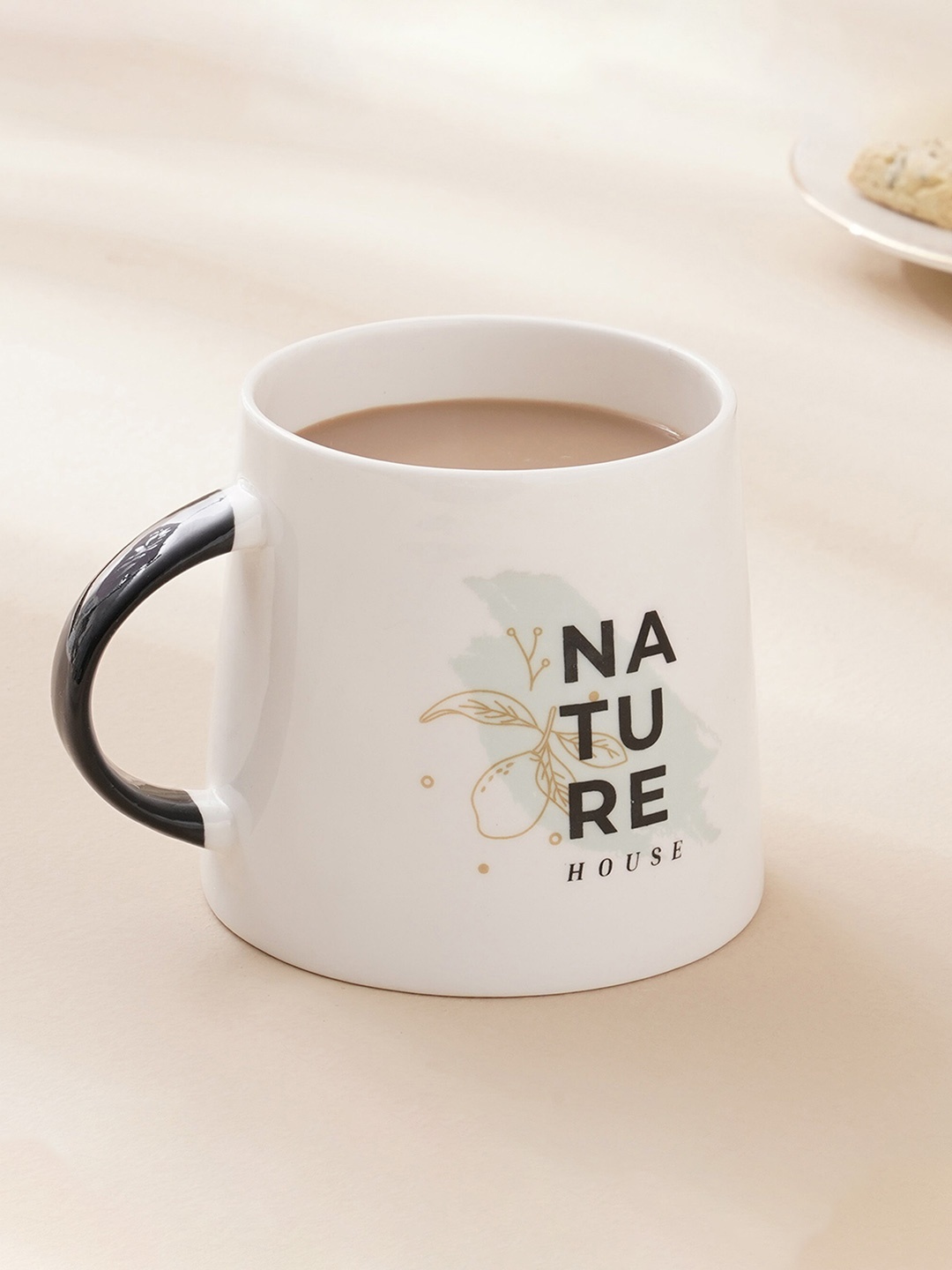 

Home Centre Corsica White & Black Printed Bone China Mugs - 470 ML